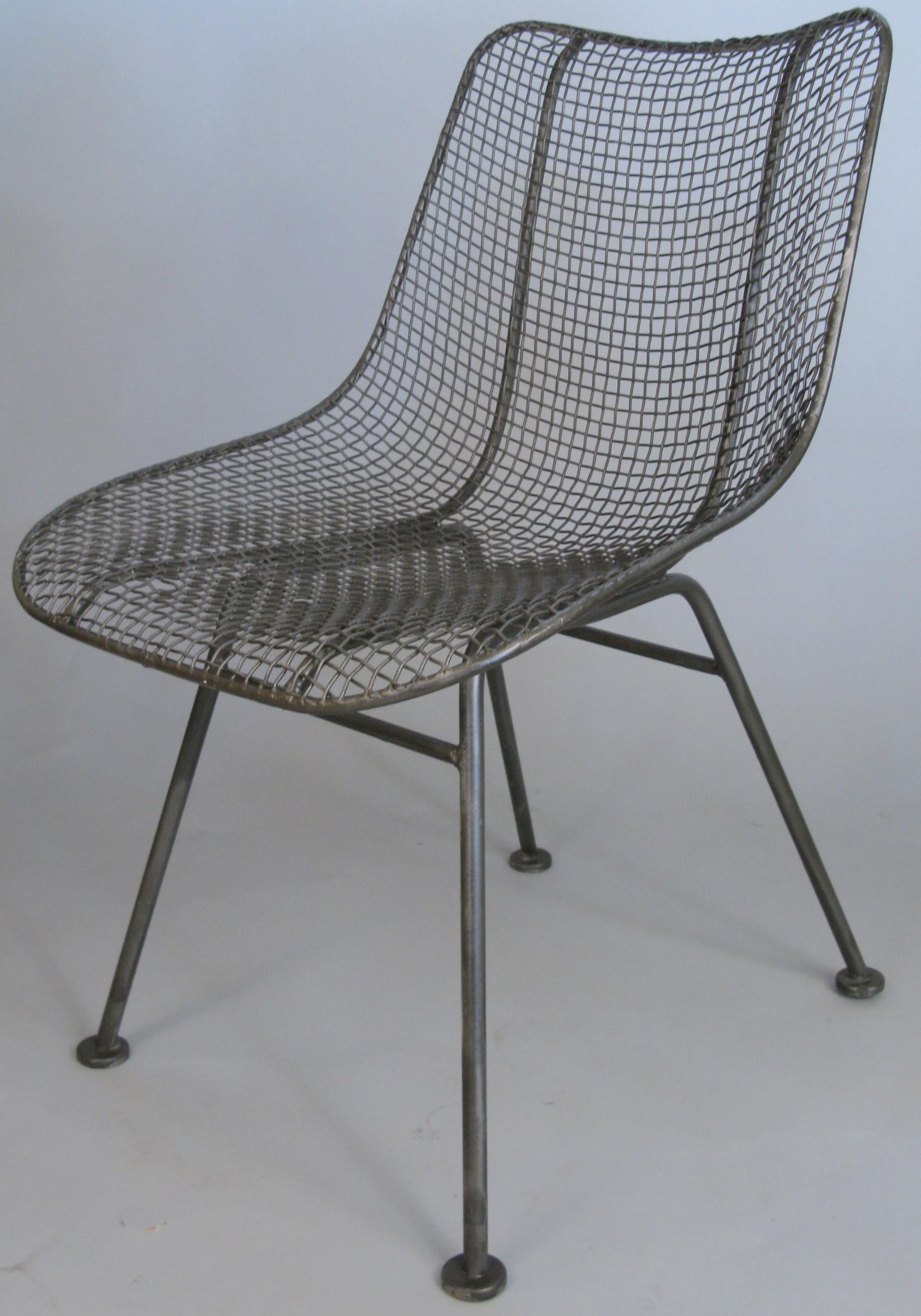 A large set of 20 vintage 1950s Sculptura dining chairs designed by Russell Woodard. Made with a wrought iron frame and woven steel mesh seat. These have been refinished in a greige color, although we can arrange to change them to a color of your