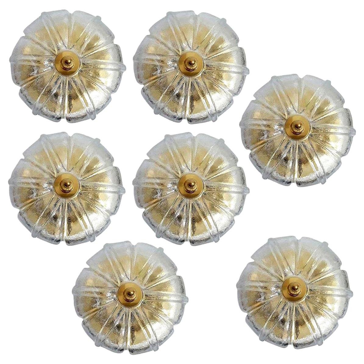 Large set of Limburg glass wall lights or ceiling lights tulip shaped shade on a brass frame, circa 1970s, Germany.
Illuminates beautifully. The handmade high quality shades gives texture which fades towards the edges. Polished brass base.

These