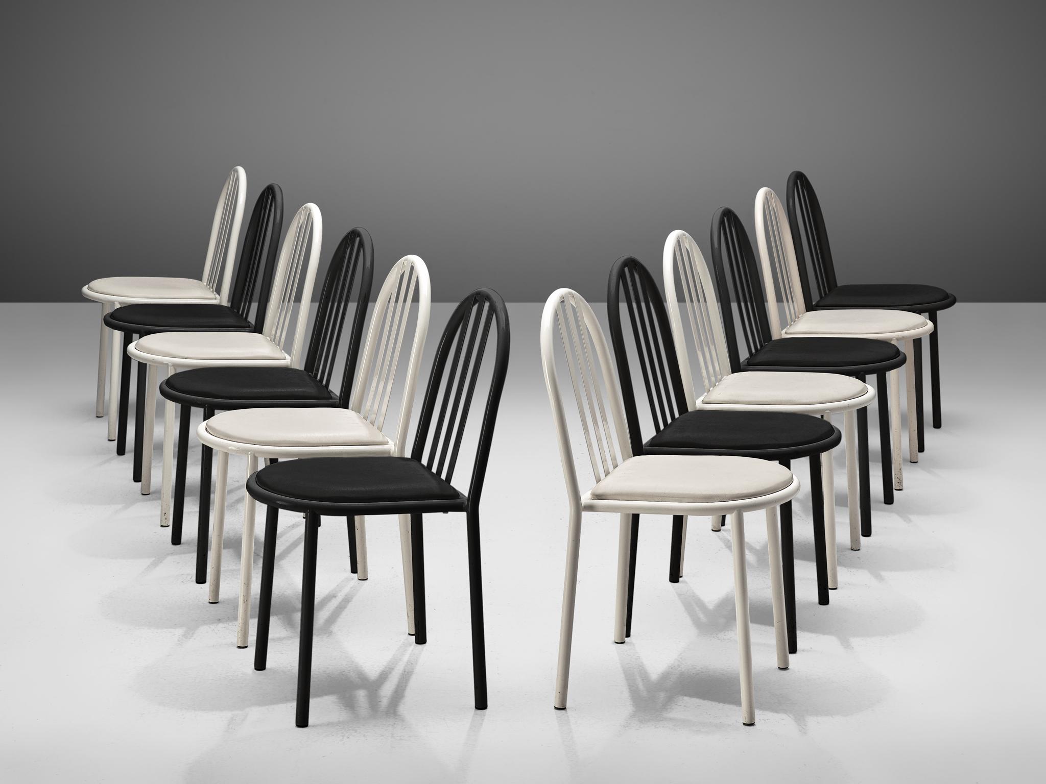 Robert Mallet Stevens for Stevens Designs, large set of dining chairs, lacquered metal and leatherette, France, design 1928, production later.

Large set of white and black lacquered tubular chairs designed by the one of the masters of the Modern
