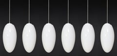 Large set Pendants Ellipse Opaline Glass, Europe the 1960s.
