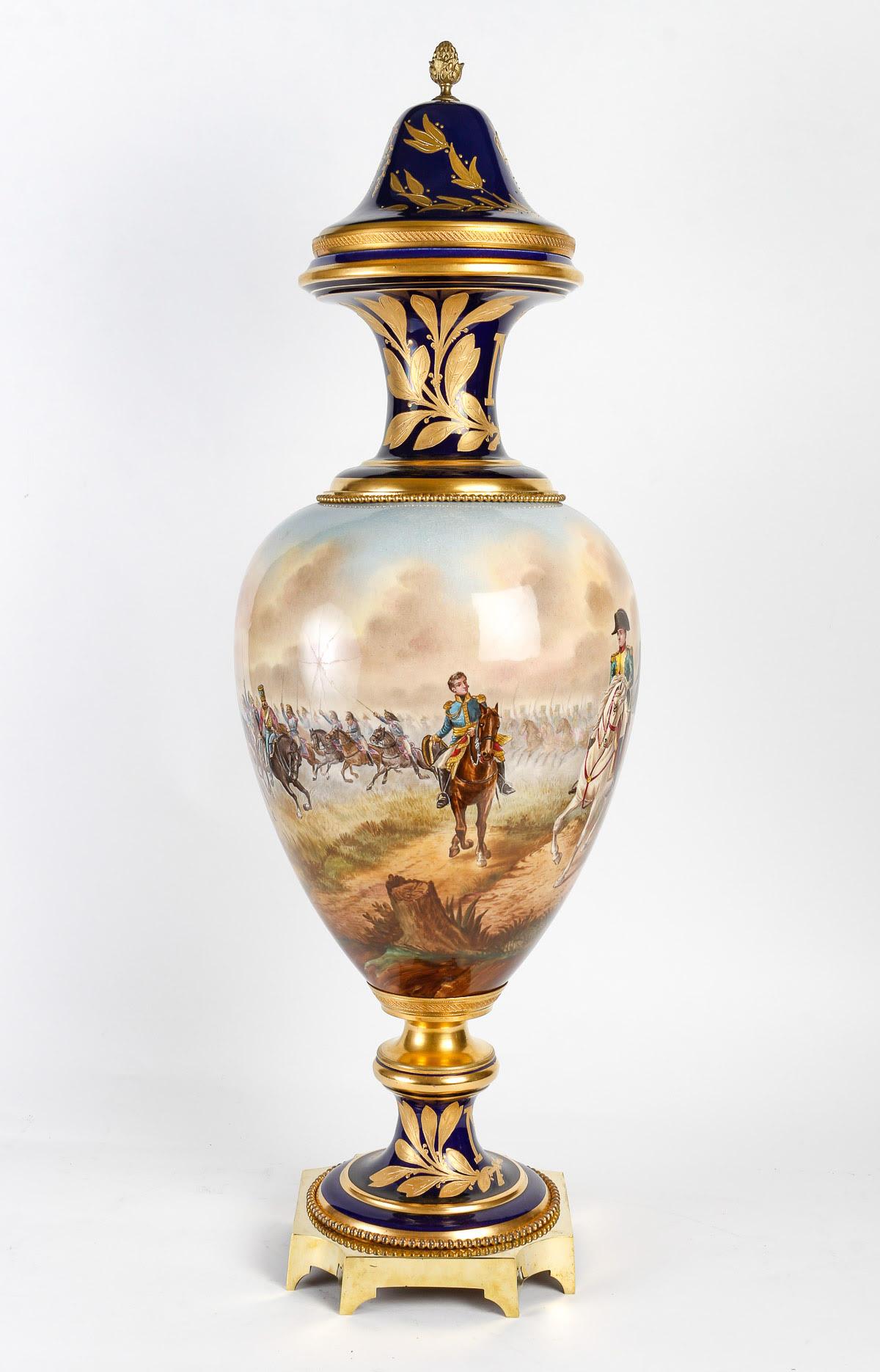 Large Sèvres porcelain and gilt bronze vase.

A large Sèvres porcelain and gilt bronze vase decorated with Napoleon 1st at the battle of 1809, signed, 19th century, Napoleon III.

H: 86cm, D: 32cm