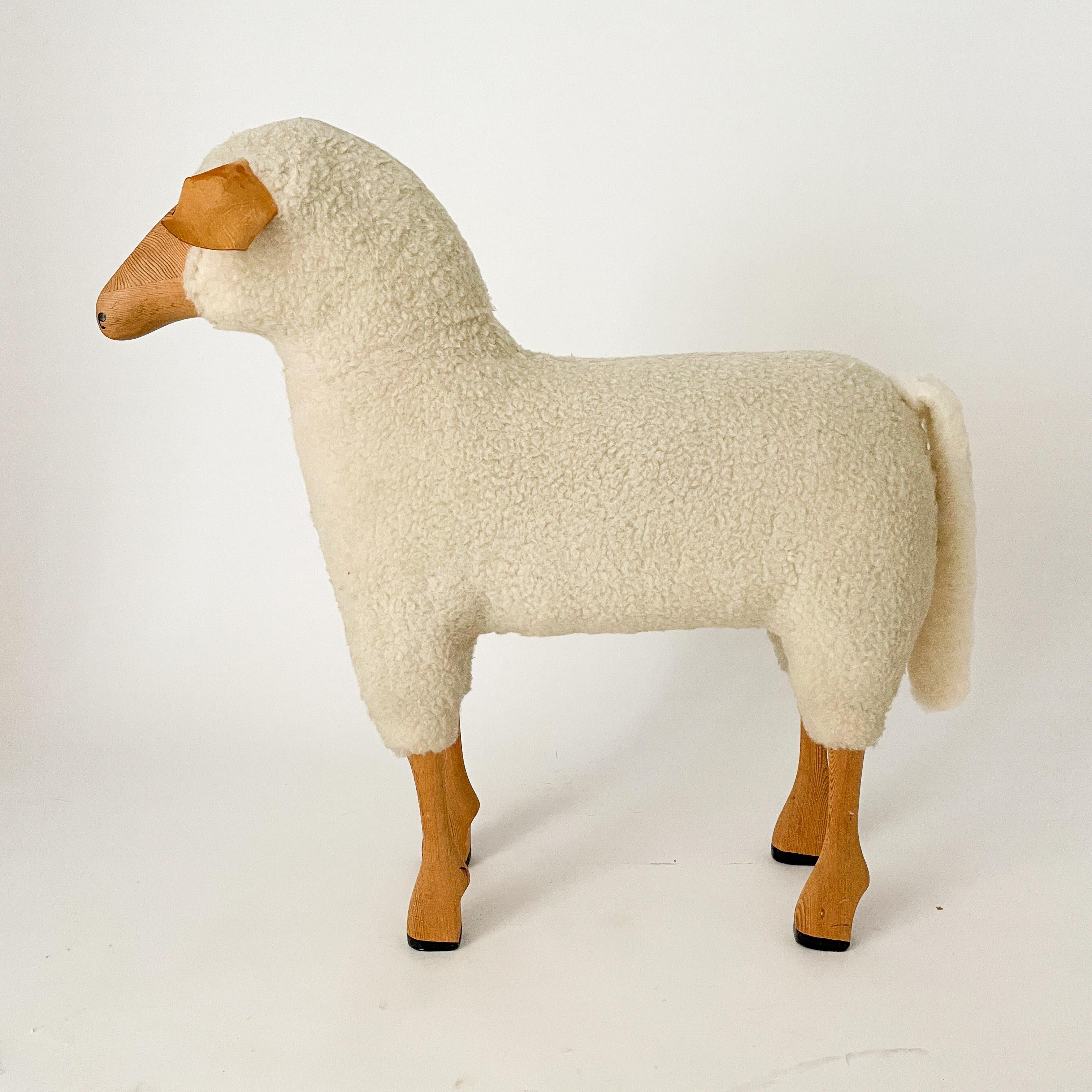 Designed by Hanns-Peter Krafft for Meier. This sheep is a playful interpretation of a stool, but also acts as a sculptural accent. Handmade in Germany, this piece has a beautiful patina throughout; wood has darkened beautifully, leather shows just