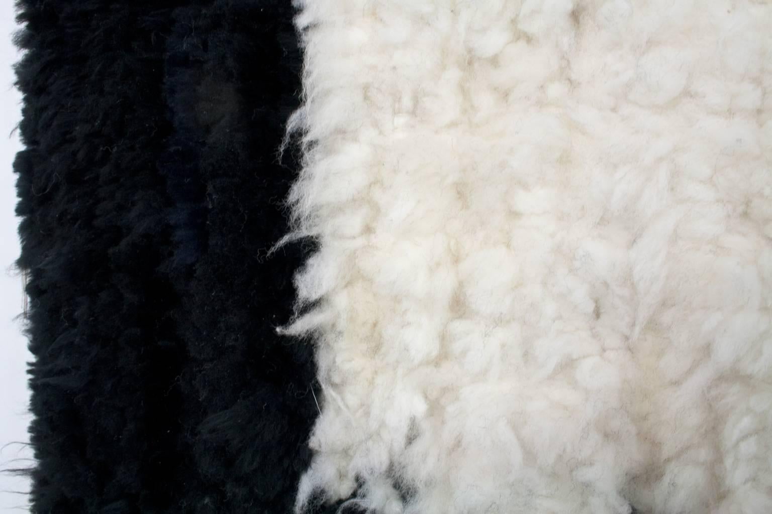 black and white sheepskin rug