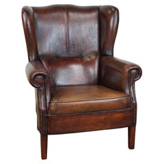 Large Sheepskin Leather Wingback Armchair with a Fixed Seat Cushion