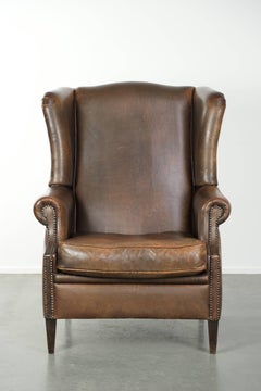 Large sheepskin wingback armchair with beautiful warm colours