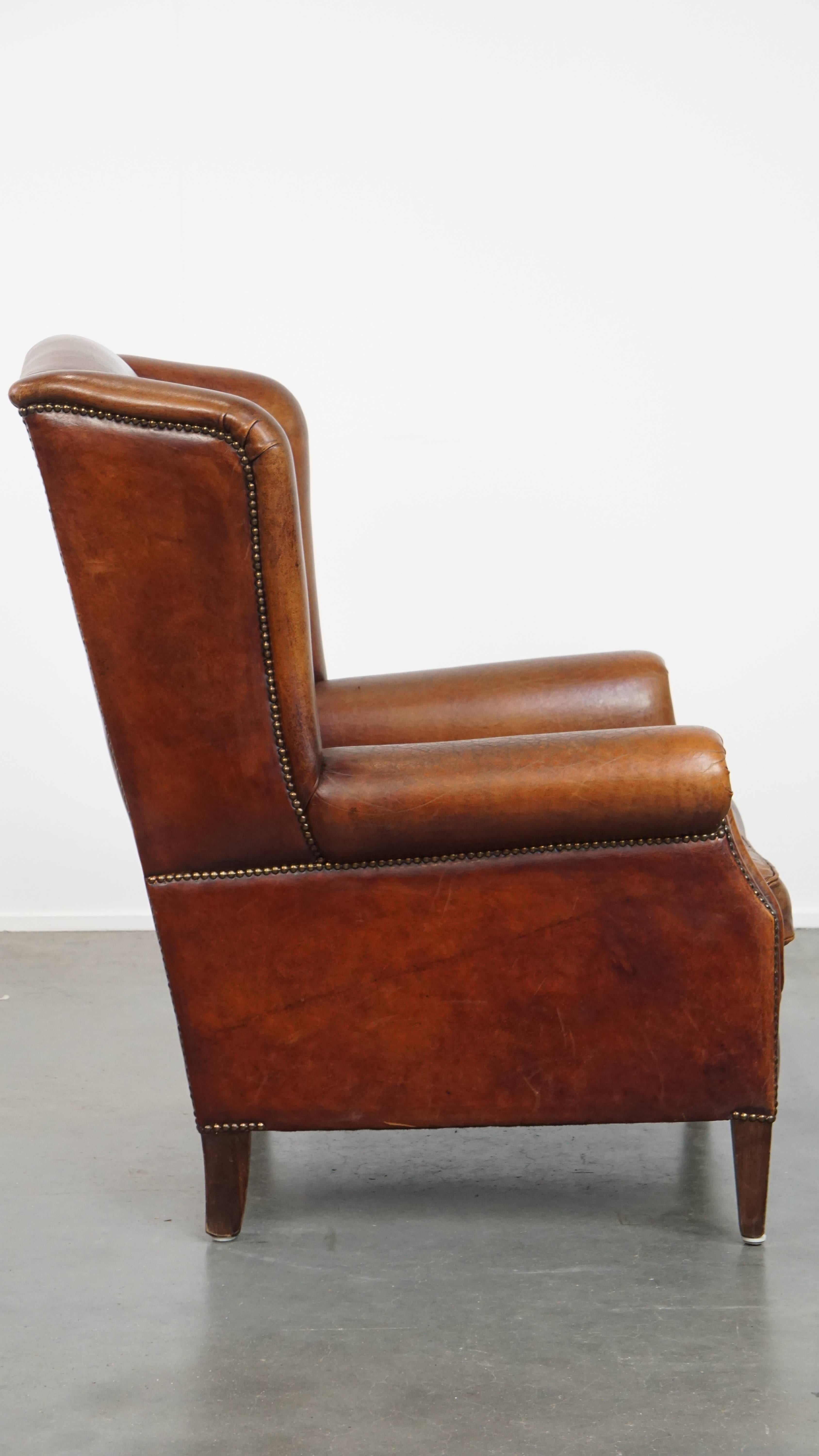 Classical Roman Large Sheepskin Wingback Chair For Sale