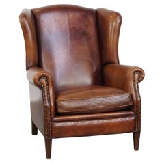 Silla grande con respaldo de piel de oveja