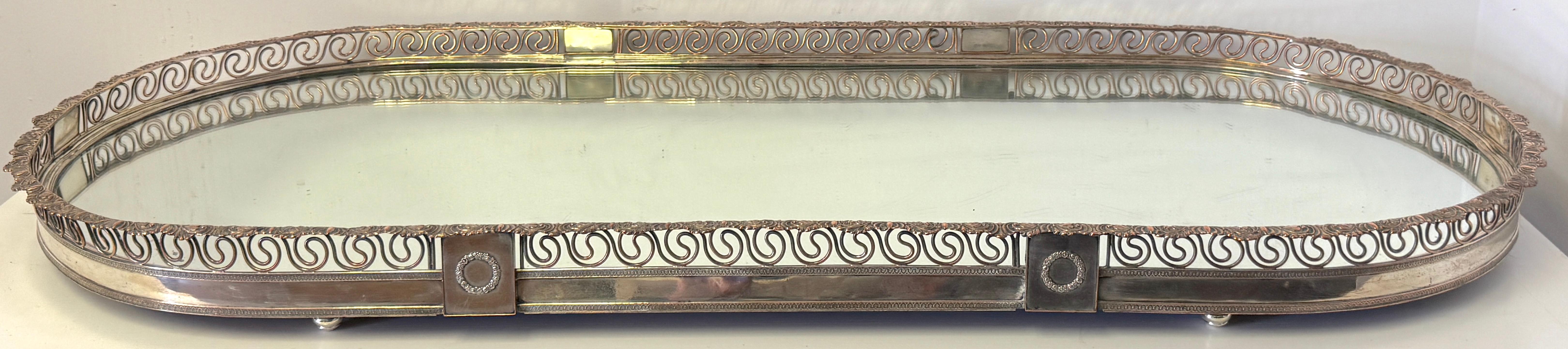 Large Sheffield Plate Mirrored Table Centerpiece / Surtout de Table / Plateau, Attributed to Mathew Boulton Workshop, William IV Period, Circa 1830

An exceptional and rare Sheffield plate mirrored surtout de table (plateau centerpiece), attributed