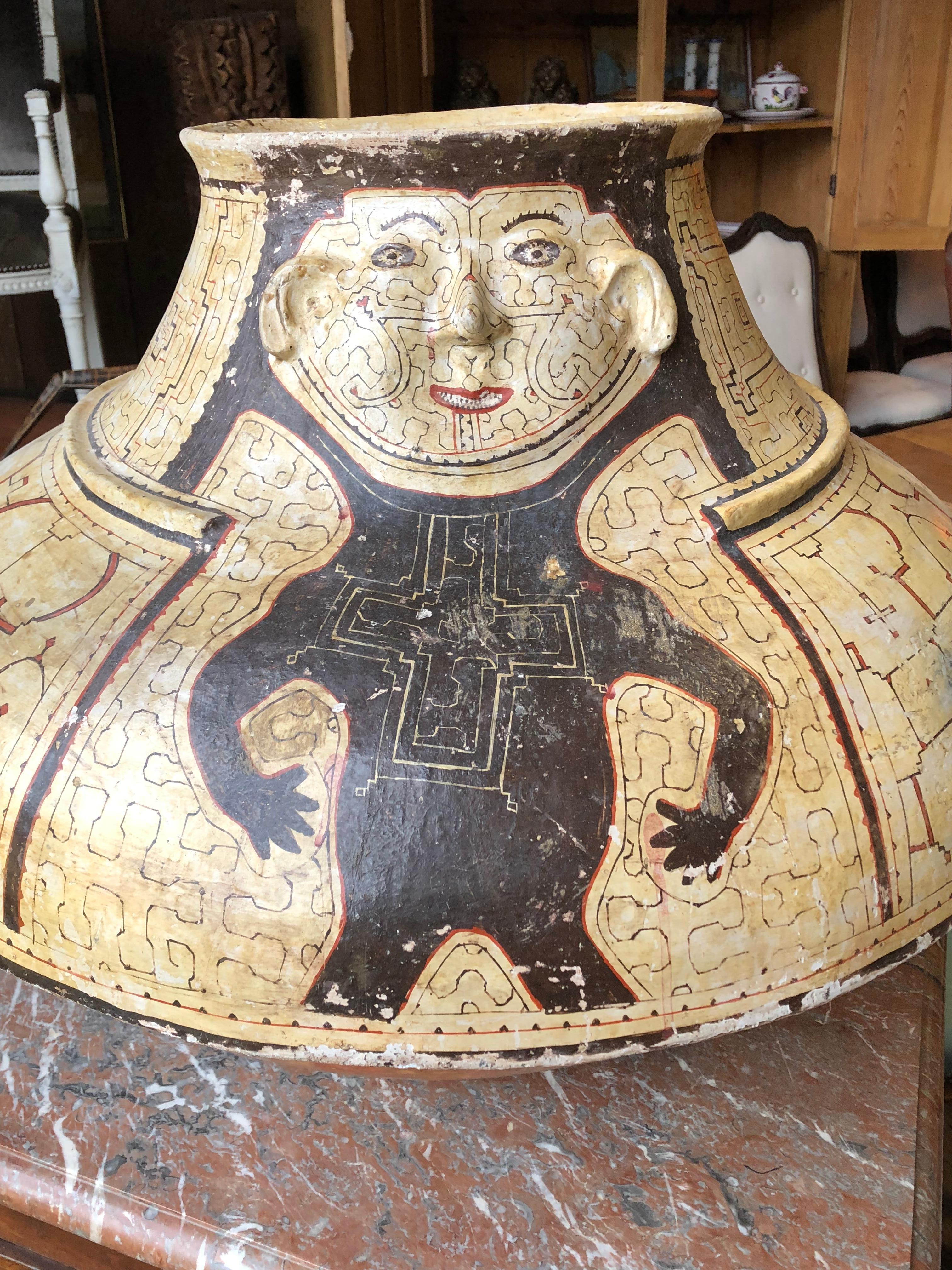 A wonderful and rare very large clay ceremonial jar made by the Shipibo-Conibo people of the upper Amazon region in Peru, circa 1950. Made by looping ropes of clay, one on top of another, then firing and hand painting them with elaborate geometric