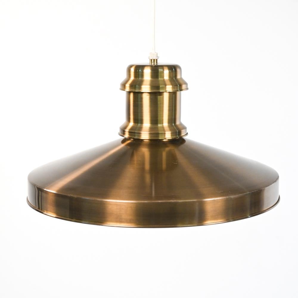 A beautiful and rare oversized pull-down pendant lamp in brushed brass, designed by Sidse Werner for Holmegaard, produced in the 1970's.