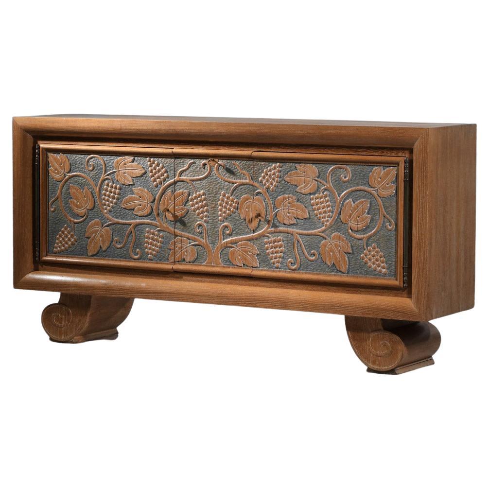 Large sideboard by René and Gilbert Schmitt in limed oak with vine leaf