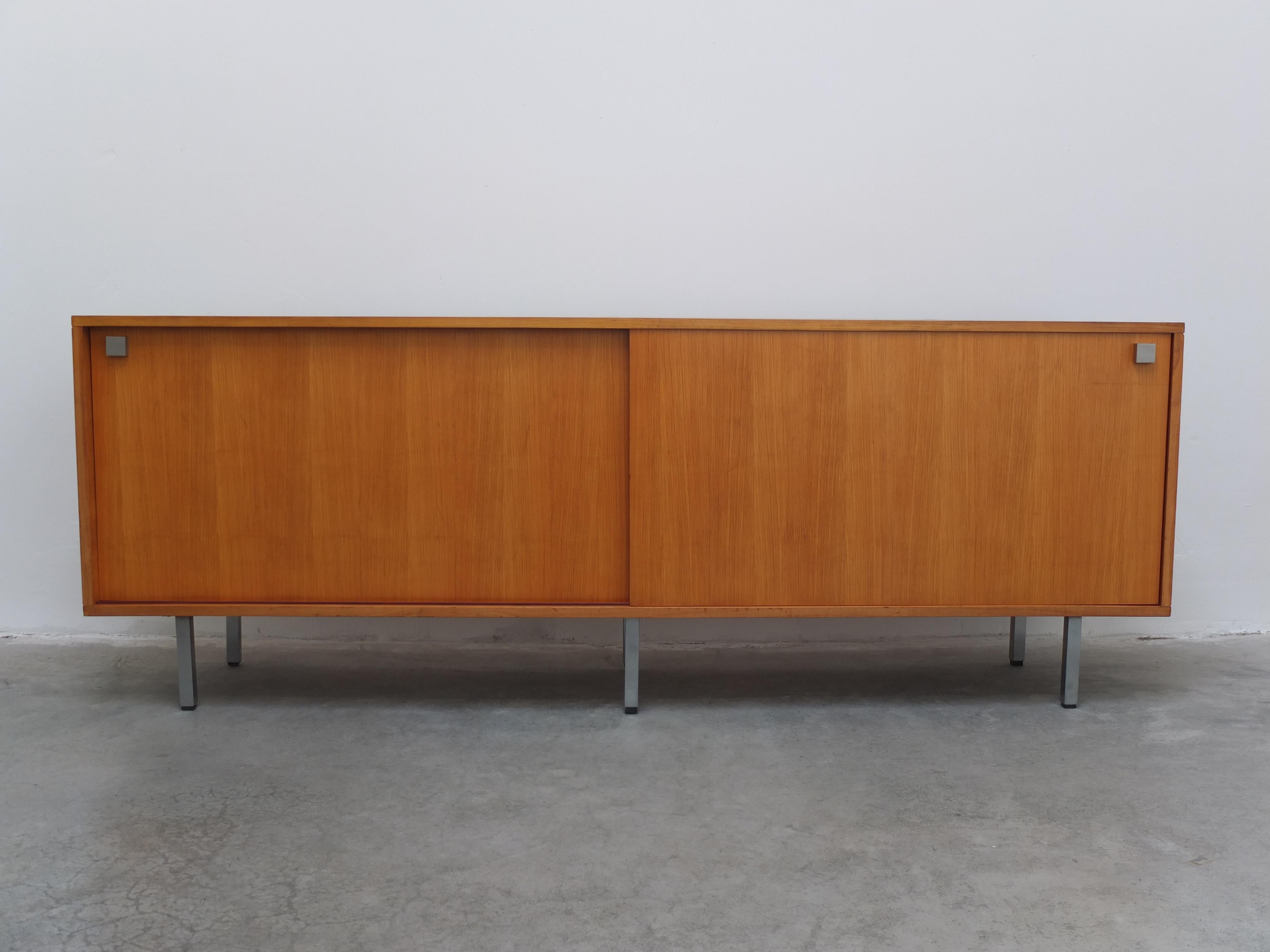 A great large sideboard designed by Belgian modernist designer Alfred Hendrickx for Belform, 1960s. This model comes in a rare honey-colored wood veneer which is rarely seen. Normally these sideboards are made in rosewood or teak. This wood color
