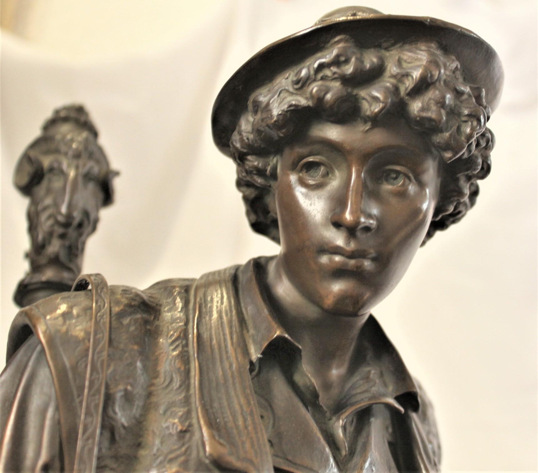 Cast Large Signed Eutrope Bouret Bronze Sculpture of a Young Man Carrying a Harp For Sale