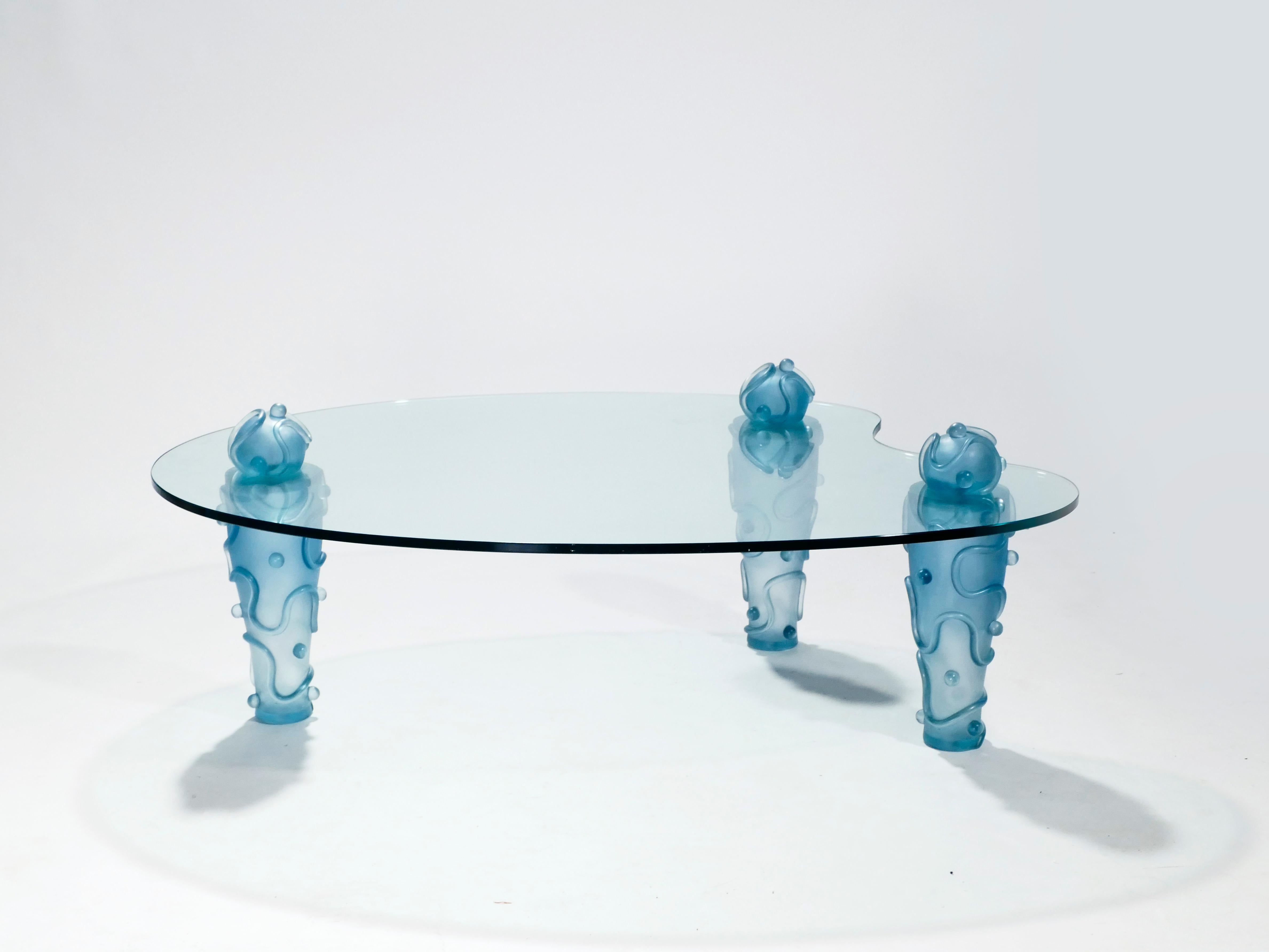 Cool colors, asymmetry, and a fanciful design make this 1990s coffee table a statement piece, especially for those that believe passionate expressions of creativity go hand-in-hand with interior design. Elizabeth Garouste & Mattia Bonetti are a team