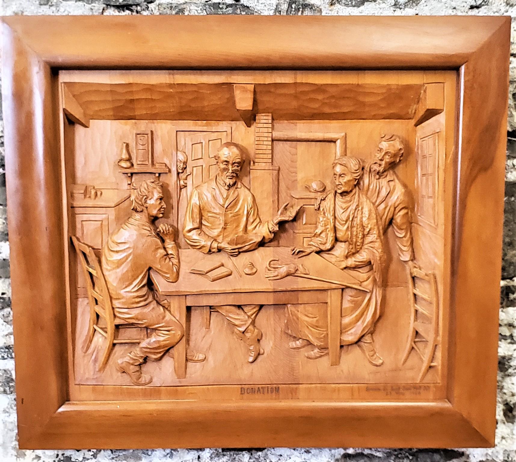 This large and substantial wall hanging was done by the renowned Quebec folk art carver Jean-Julien Bourgault of Quebec Canada in his signature Folk Art style. This large hand-carved shadow box styled panel depicts a detailed vignette of several