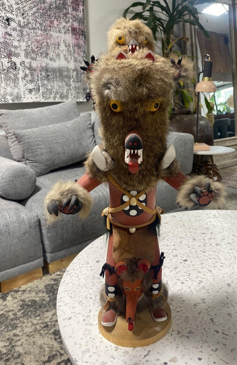 A wonderfully hand-crafted/detailed and decorated Native American Hopi Wolf Kachina doll. Quite an unusually large work. A striking piece overall. Hand-painted with fur accompaniment (we are not sure what type of fur was used). 

Hopi katsina