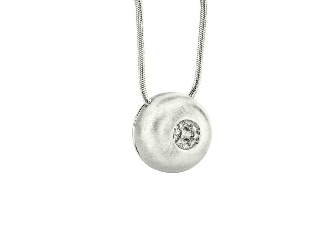 This White Sapphire in Large Silver Dome Pendant, part of our Power Series, is a symbolic design inspired by the idea of looking inward, the notion of what a person needs is already inside of them. The clean and classic lines are imaginative,