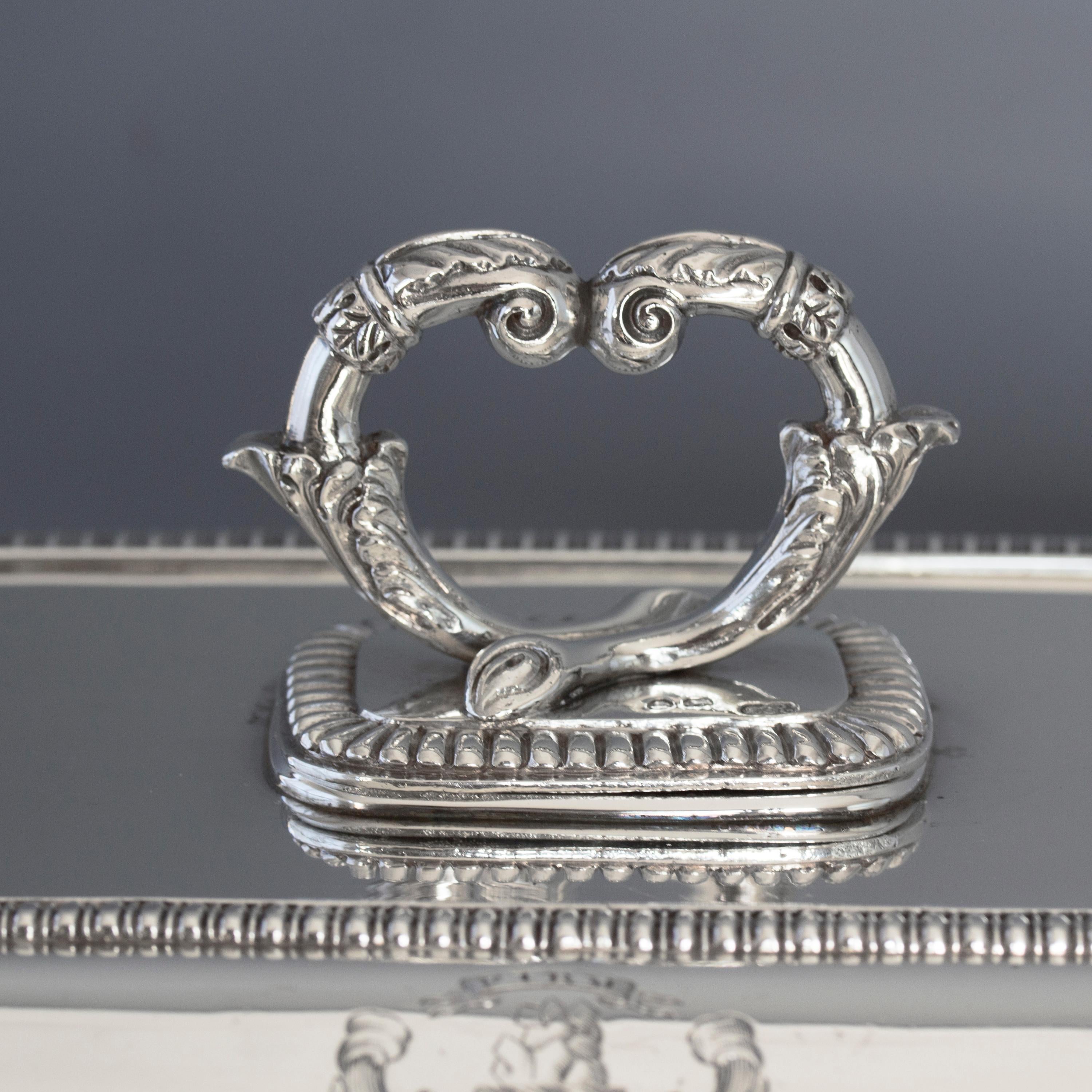 A superb good sized Georgian silver entree dish of rectangular cushion form. The top and edges with gadrooned decoration. The twist off handle with conforming decoration and heart shaped cornucopia. 
 
This also comes with a contemporary old
