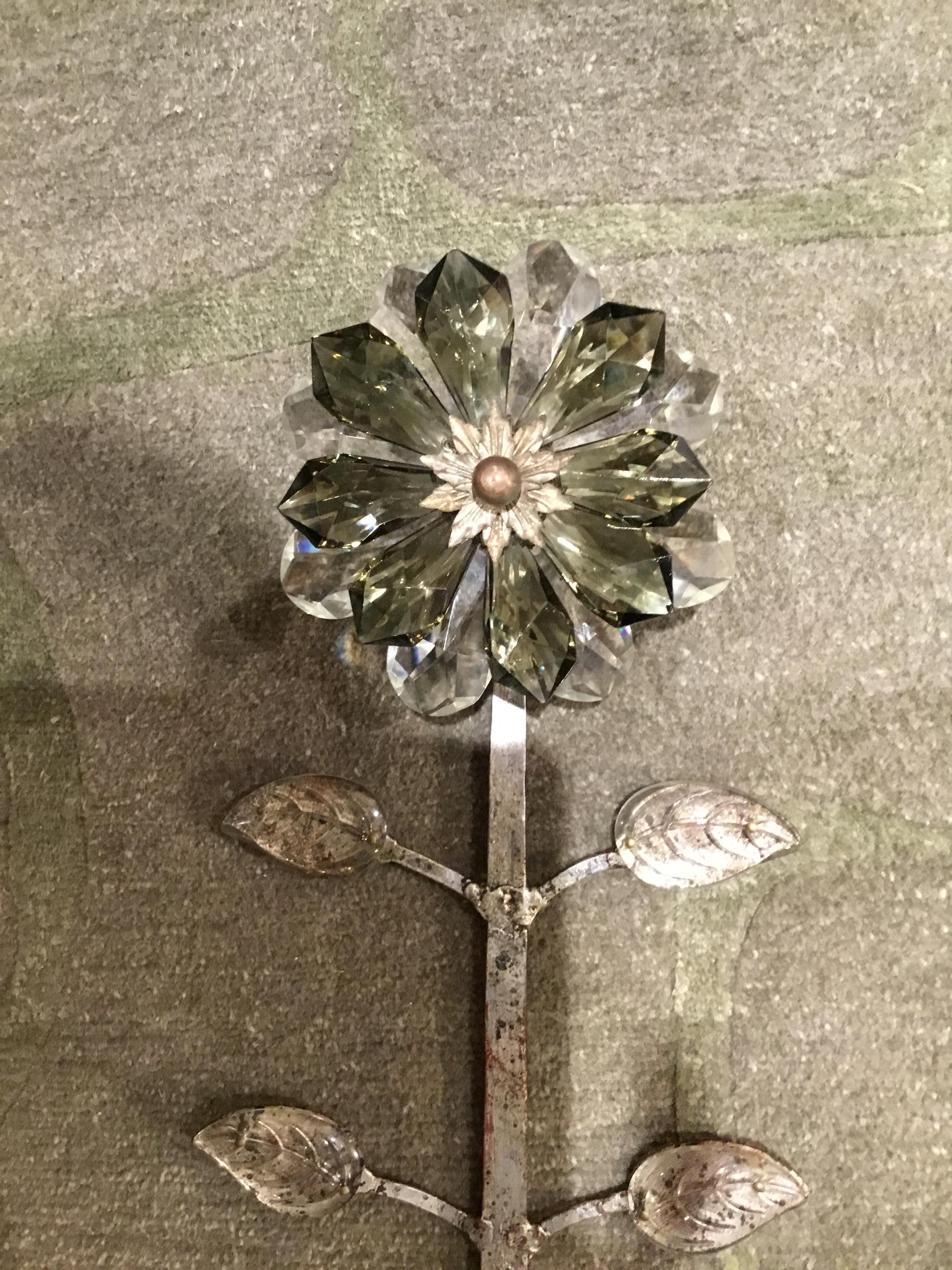 Pair of large French sconces attributed to Maison Baguès. Original silver finish with crystal urn scrolling vines with crystal leaves
And a deeper silver color crystal flower.
  
