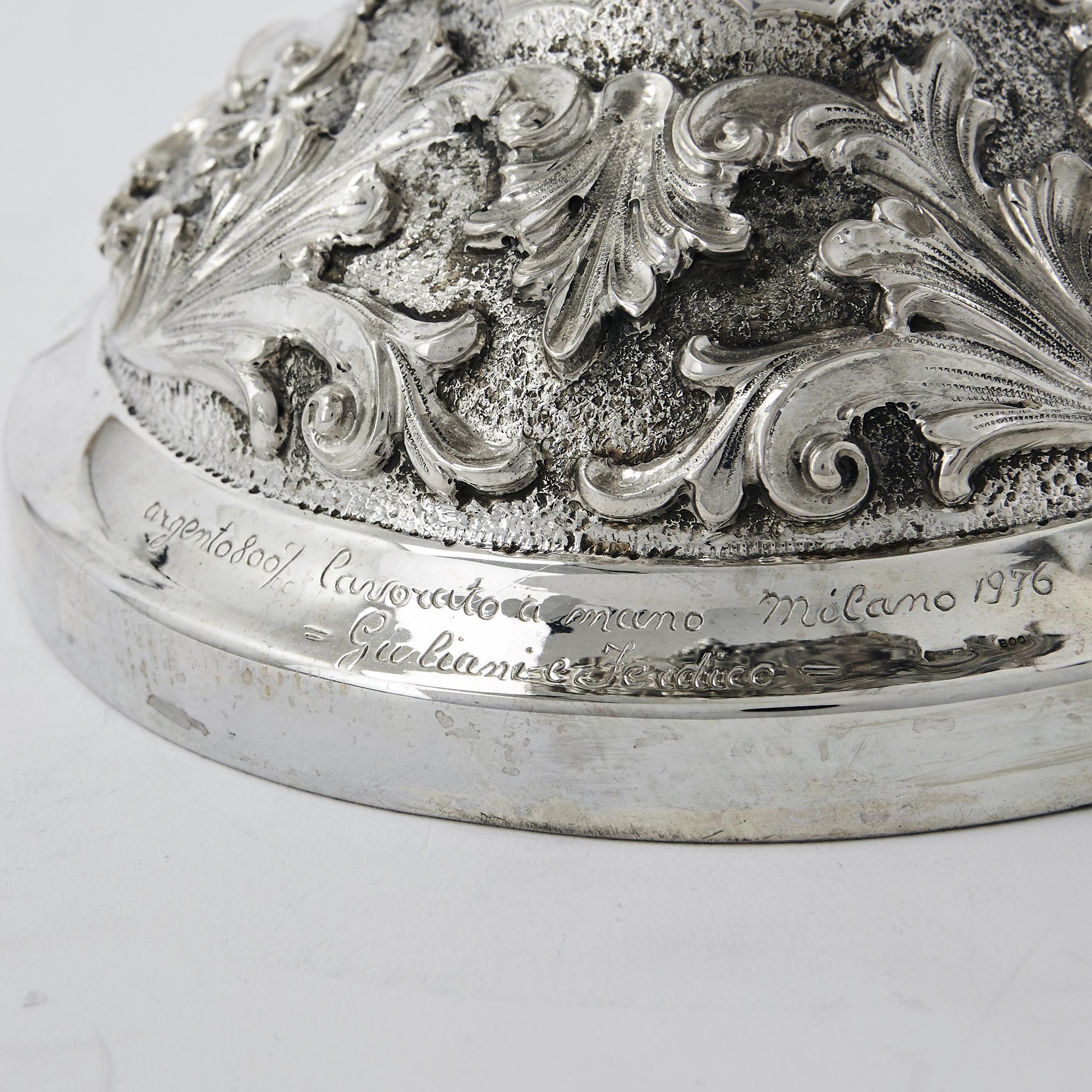 A highly impressive handmade and hand-chased 20th century Italian silver vase in the baroque style. Crafted from 800 silver, the vase is lightly gilded and the decorations are most finely detailed, demonstrating the exemplary skill of the