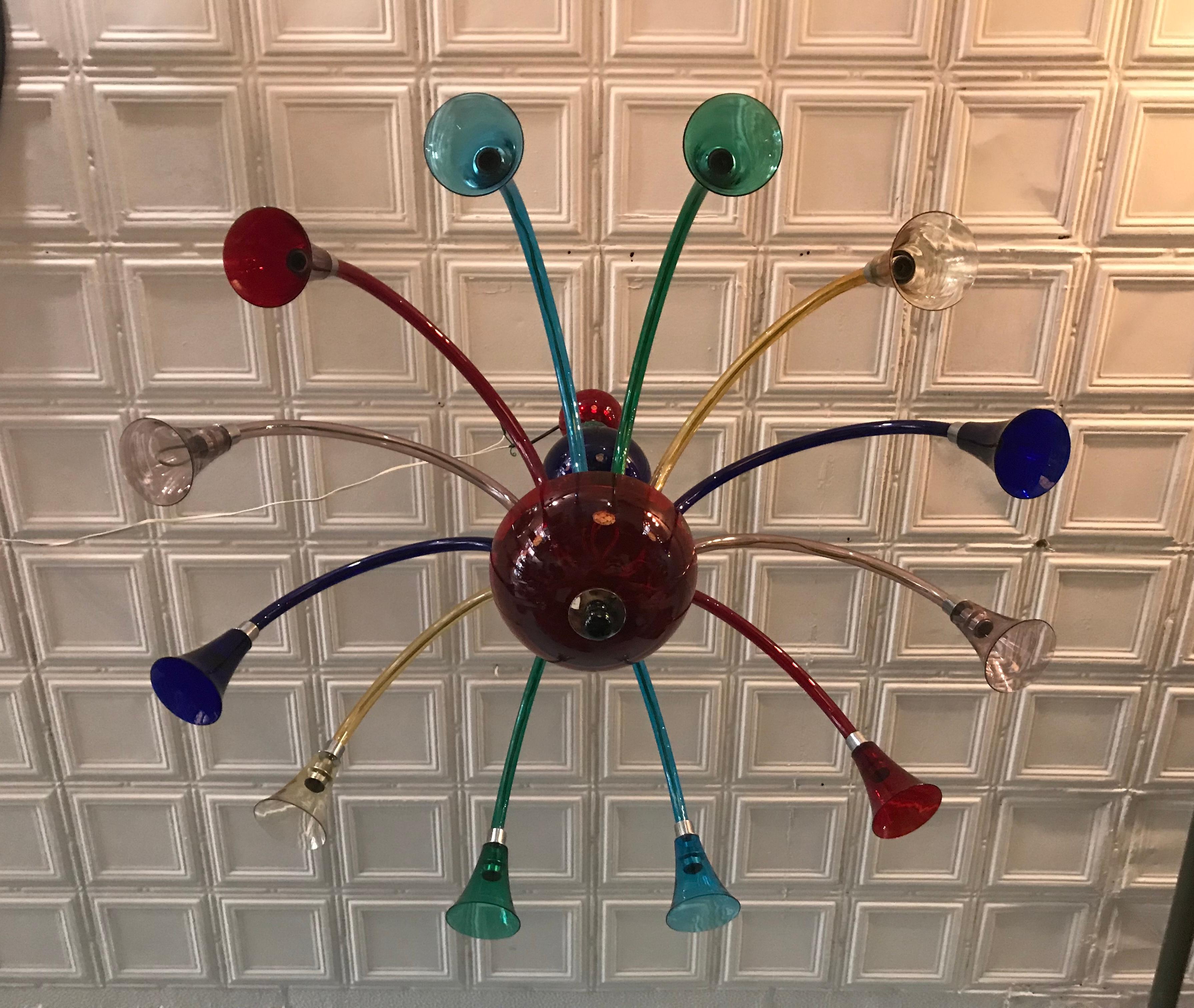 Large Simone Cenedese 12-arm chandelier, multi-color Memphis style, stunning whimsical design. Retains original label as well as etched glass signature, hand delivery avail to New York City or anywhere en route from Buffalo NY.