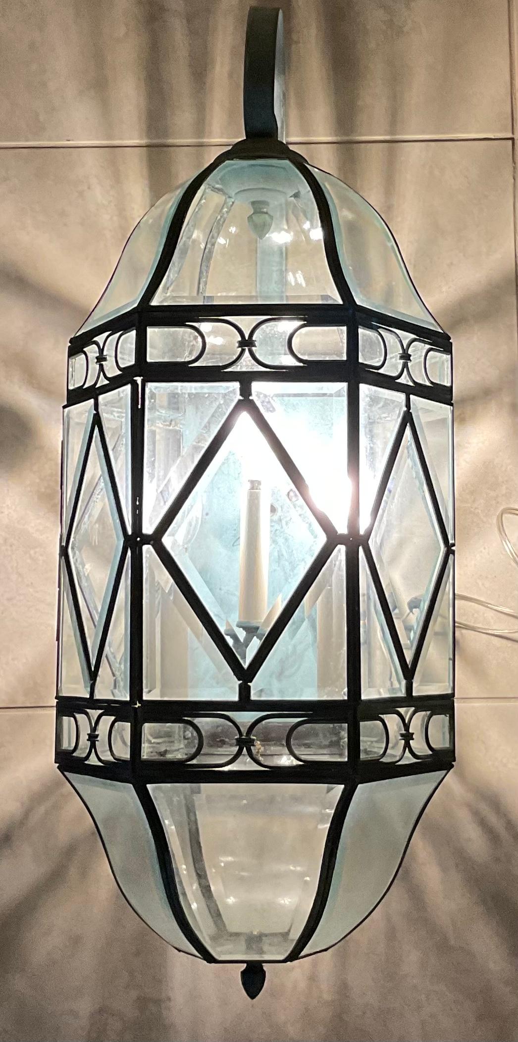 Beautiful wall lantern made of solid brass with interact thick beveled glass artistic work, That give great Light reflection when it’s on.
Three 40/watt lights.