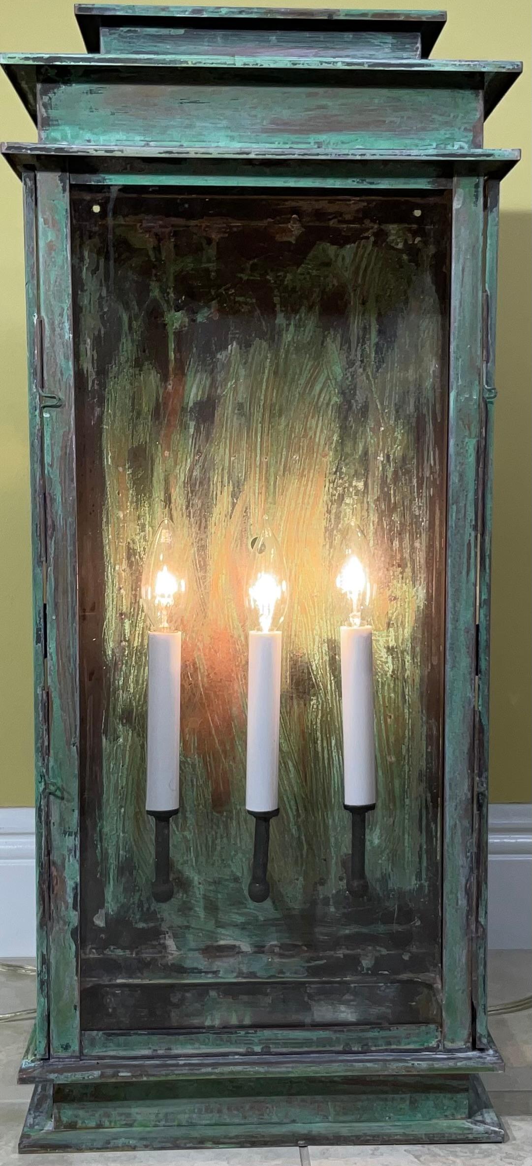 Exceptional wall lantern made of solid brass ,beautiful oxidized patina with three 60/watt light. Two side door ,very impressive light.
Suitable for wet location.