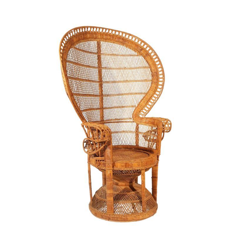 Vintage large single wicker peacock chair.  Styled after the Kok Maison chair made famous in the 1970's film Emmanuelle, the fan back rattan and wicker circular chair makes a statement