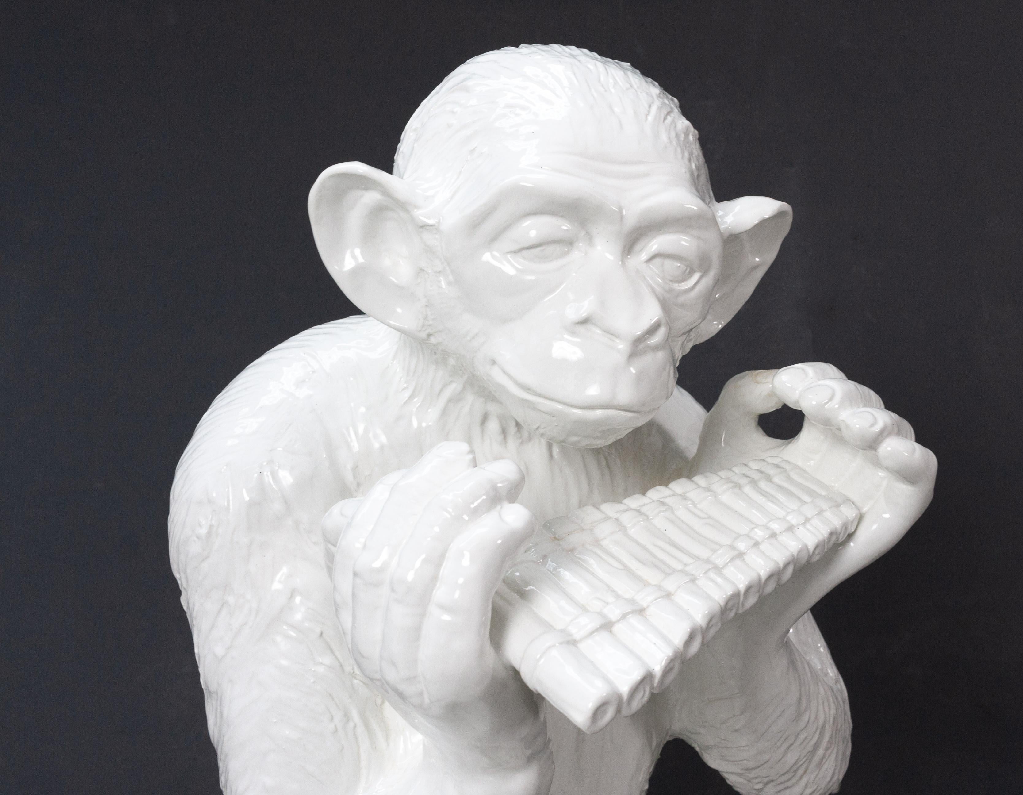 Large Sitting Chimpanzee Playing the Panpipes In Good Condition For Sale In Den Haag, NL