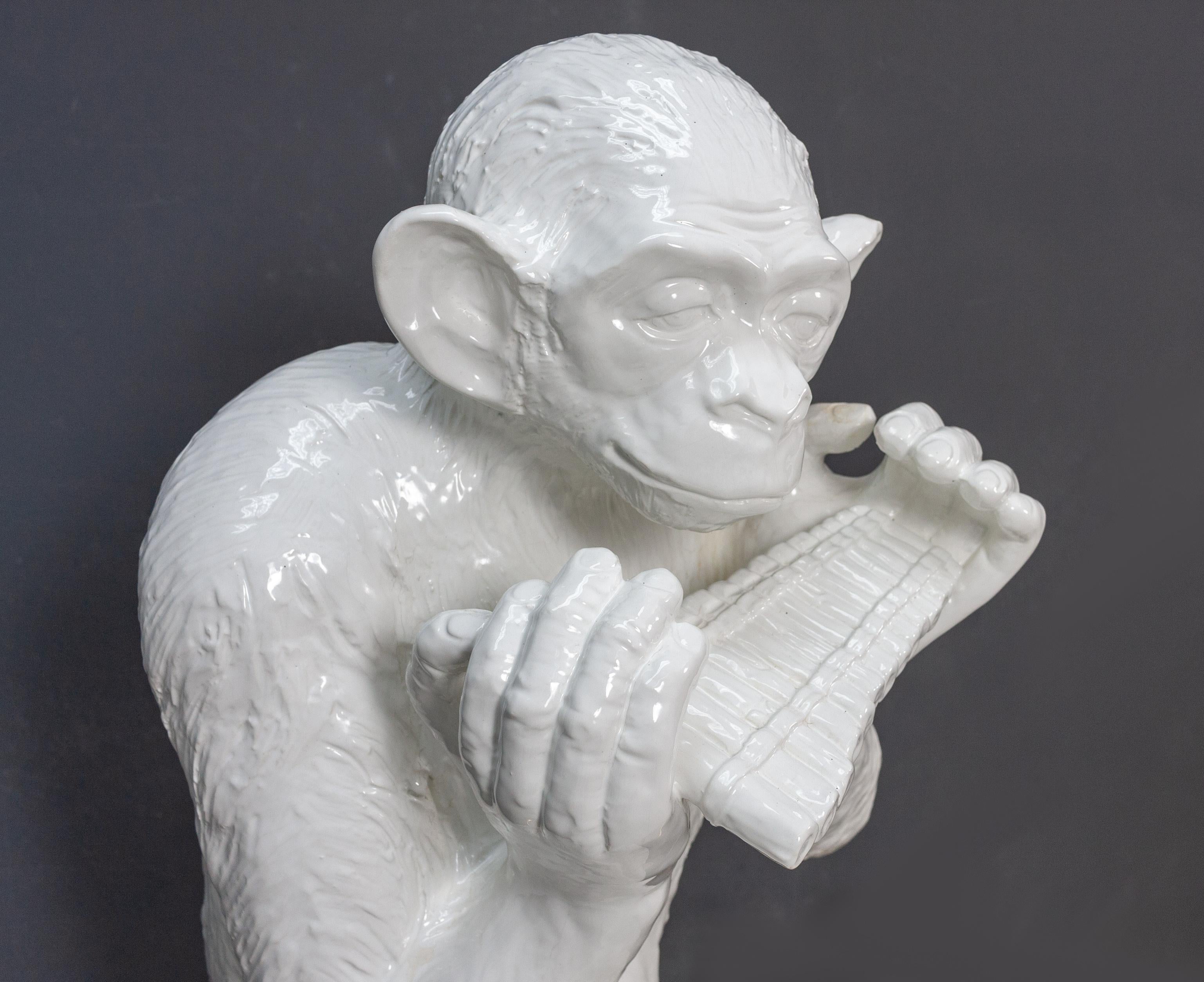 Ceramic Large Sitting Chimpanzee Playing the Panpipes For Sale