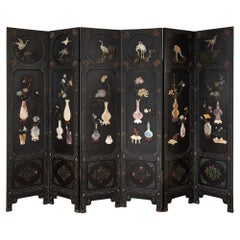 Large six-panelled Chinese hardstone and lacquered folding screen