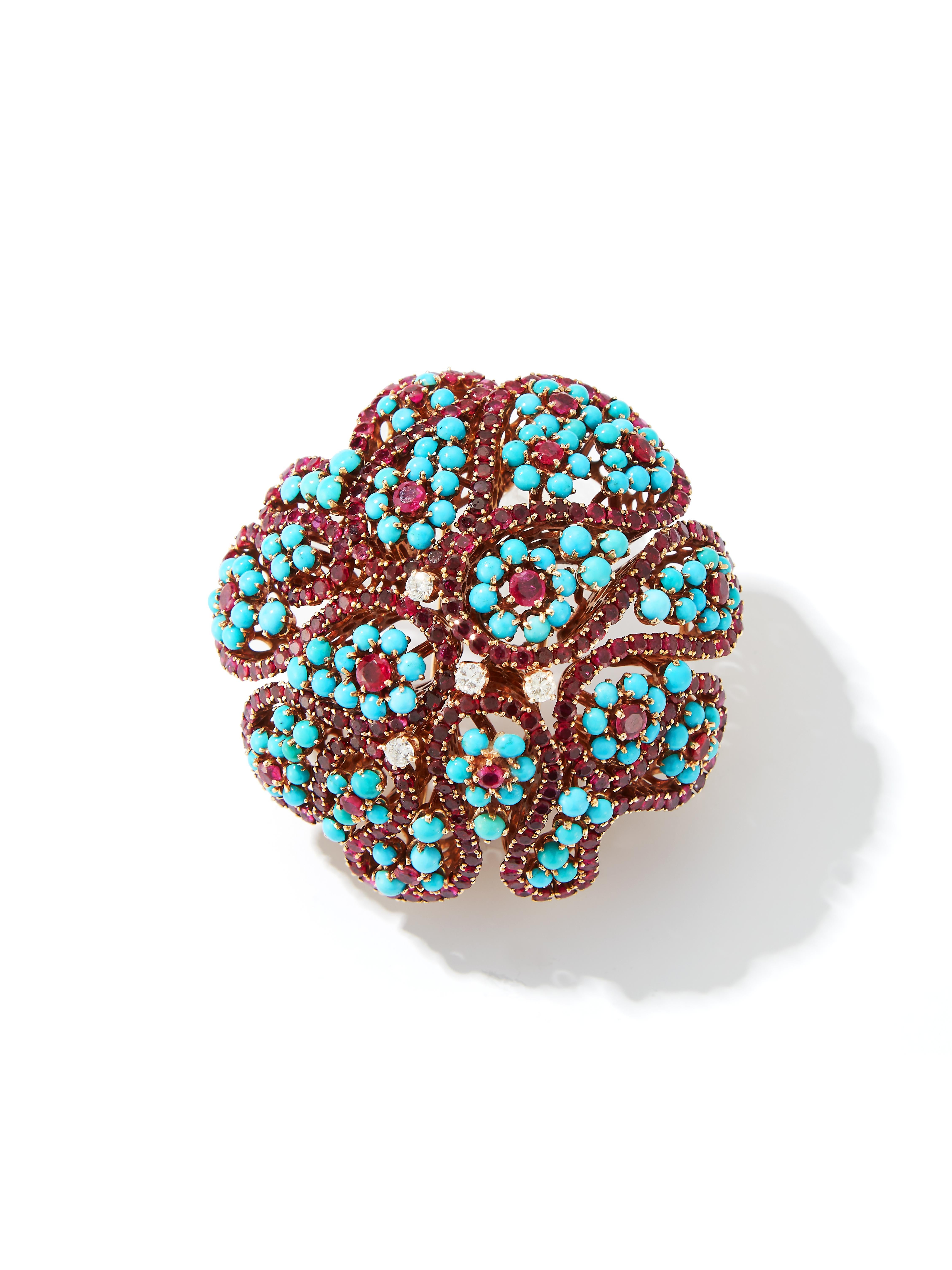 Large size Cartier Turquoise Brooch with Rubies and Diamonds

Beautiful large size floral cartier brooch with turquoise, rubies and diamonds. 

Signed: Cartier and numbered 

Metal Type: 18 karat yellow gold

Approximate Length: 2 inches