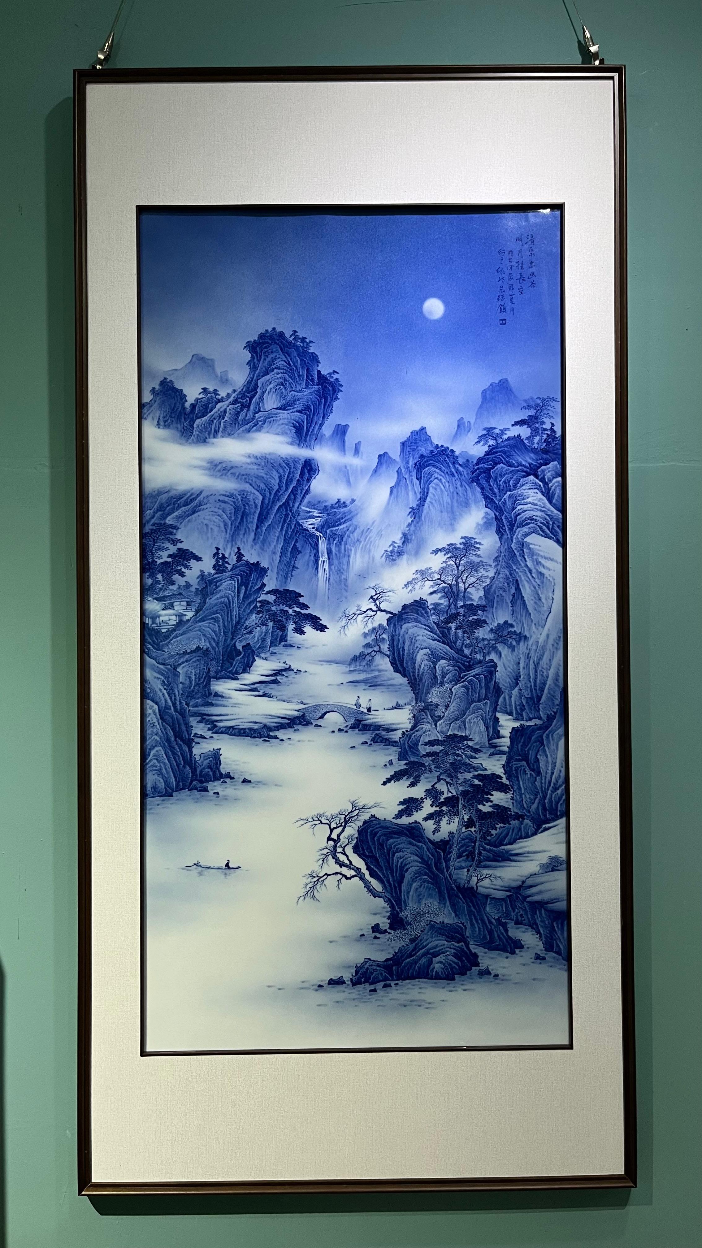 This Chinese Artist Xing Zhi Blue and White Landscape under Moon Porcelain Plaque is a stunning example of traditional Chinese artistry. Hand-painted with delicate brushwork, this porcelain plaque depicts a serene landscape bathed in the soft glow