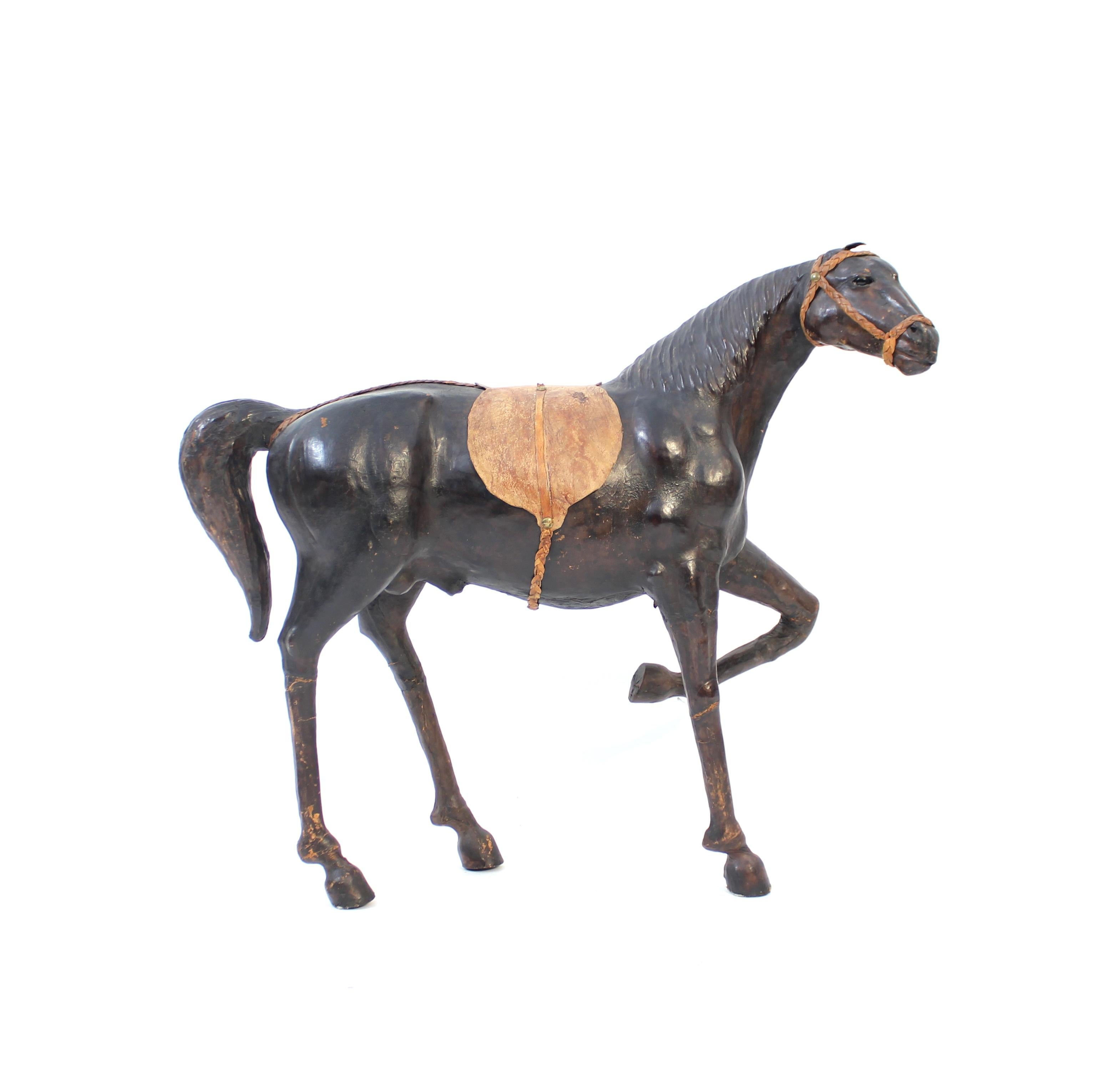 Large and majestic horse sculpture / model made of genuine leather from the 1960s or 1970s. Well made with good proportions and details. Very decorative and would be a fun and cool piece for any kind of interior from Scandinavian modern to eclectic.