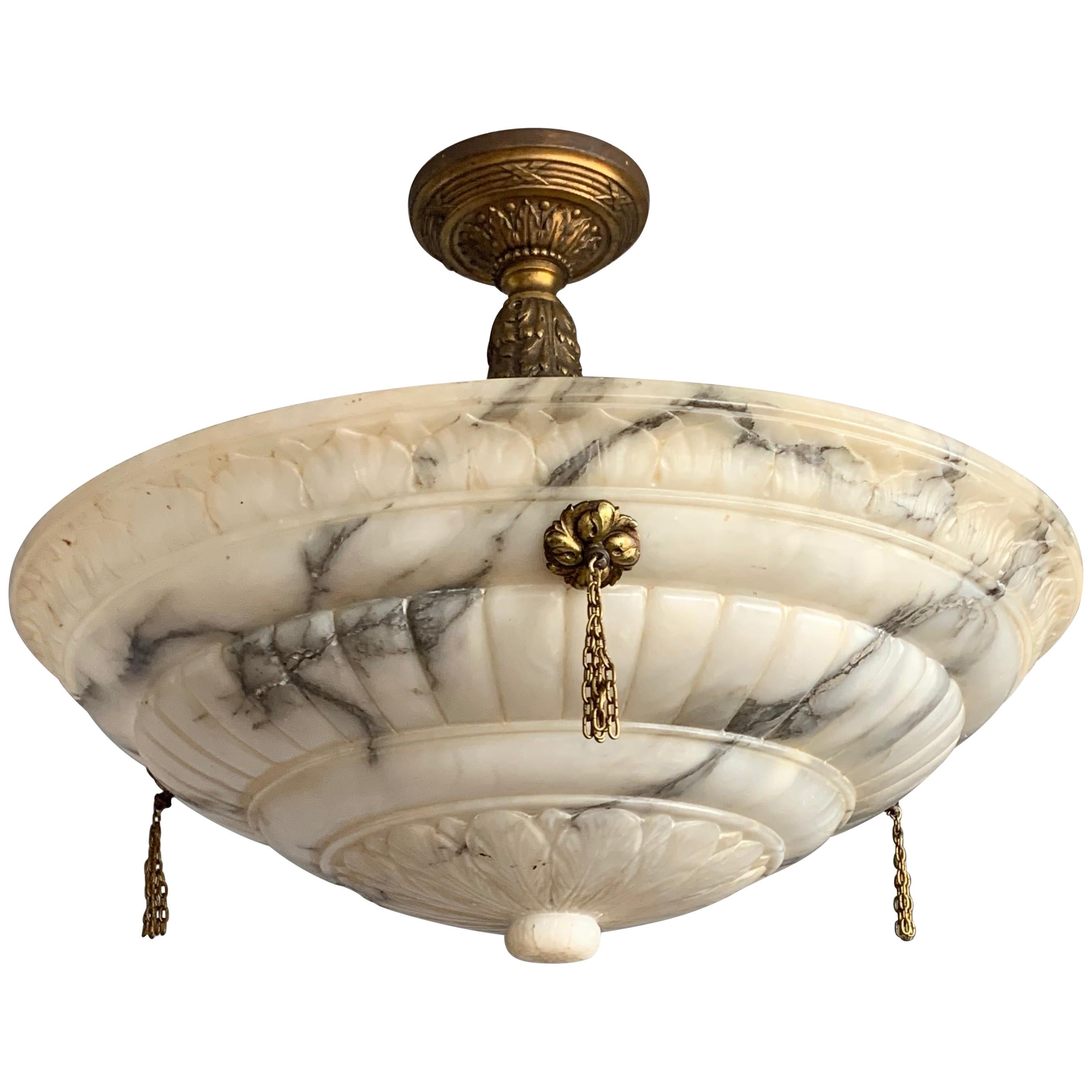Another amazing and impressive Arts and Crafts, early 20th century chandelier.

This Magnificent Creation of Mother Nature from the early 20th century, large alabaster pendant or flush mount comes with a stylish rope and a bronze canopy. It is also