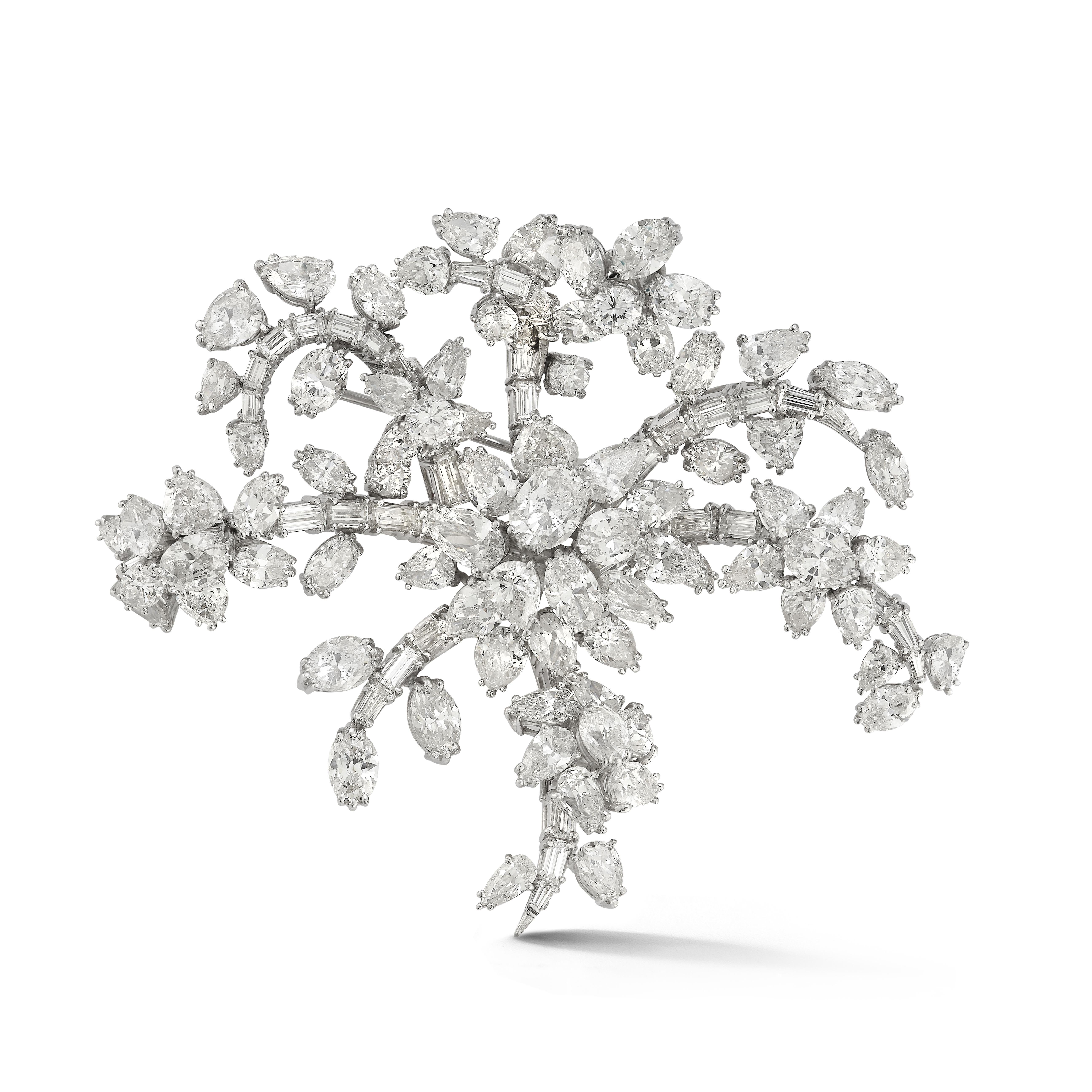 Large Size Diamond En Tremblant Brooch

 - A platinum brooch set with approximately 130 diamonds consisting of an assortment of approximately 35 pear cut diamonds, approximately 25 oval cut diamonds, & approximately 70 heart shape, round cut,