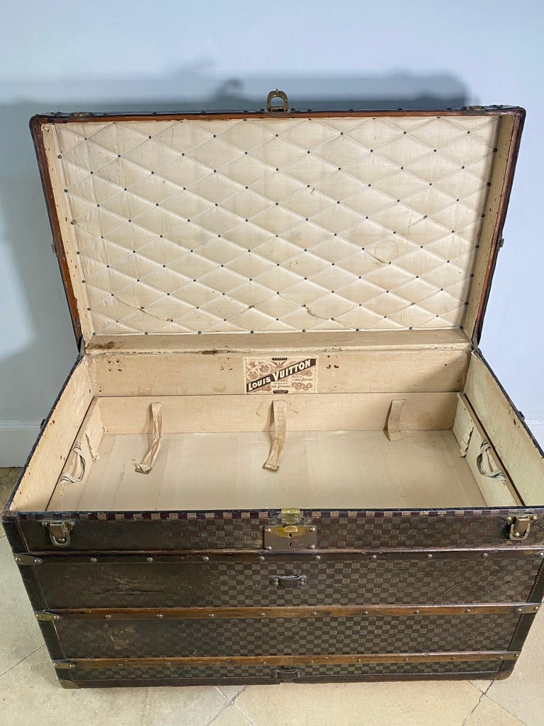 Lot - LOUIS VUITTON STEAMER TRUNK, late 19th century; fitted with two trays  bears label inside;