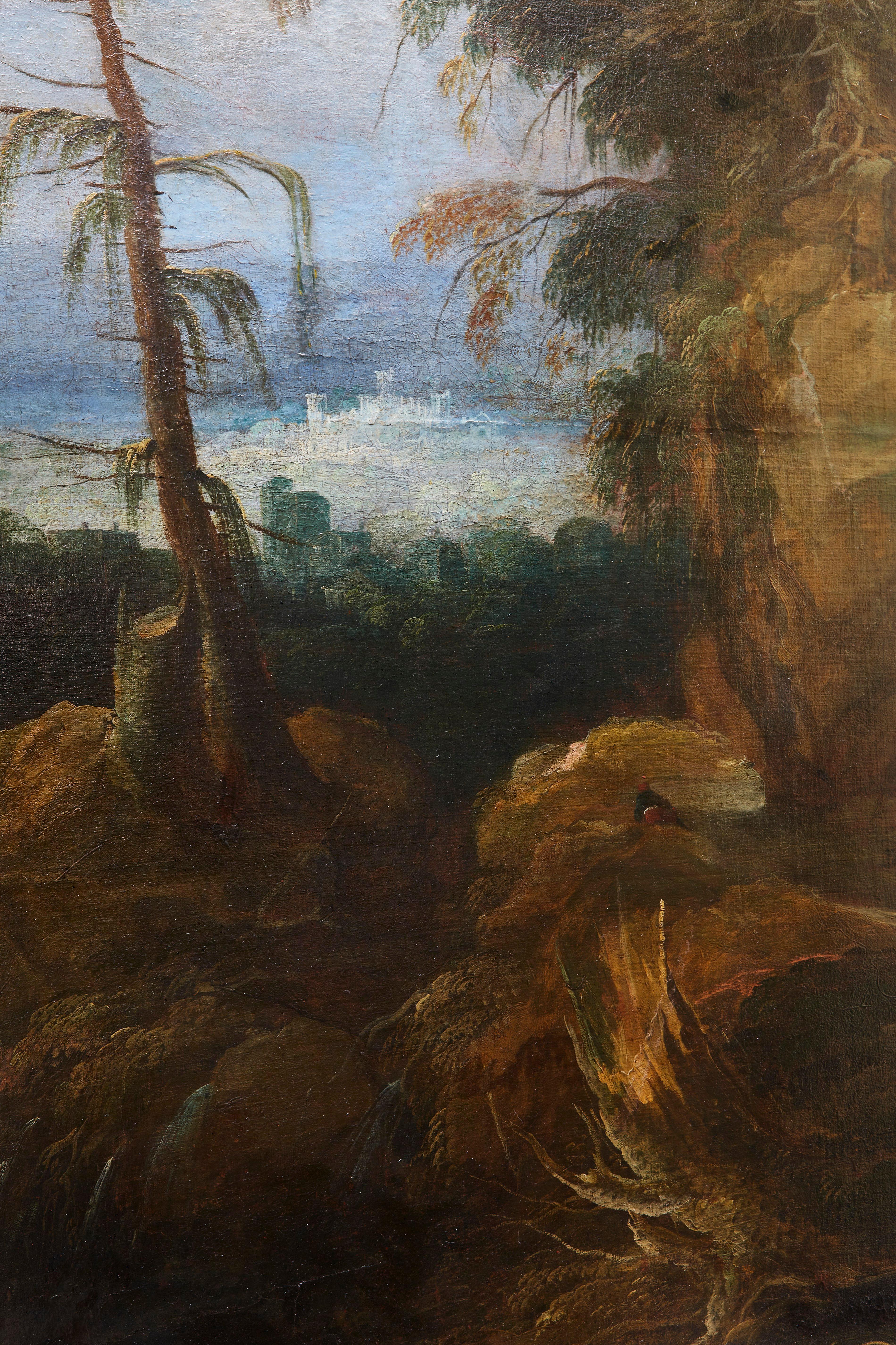 Dipinto dell'entroterra veneziano dell'inizio del XVIII secolo, un olio su tela di grandi dimensioni con un paesaggio montano barocco con ruscello, ponte, cascata, viandanti e un villaggio sullo sfondo. Il bosco è animato da figure, una carovana con