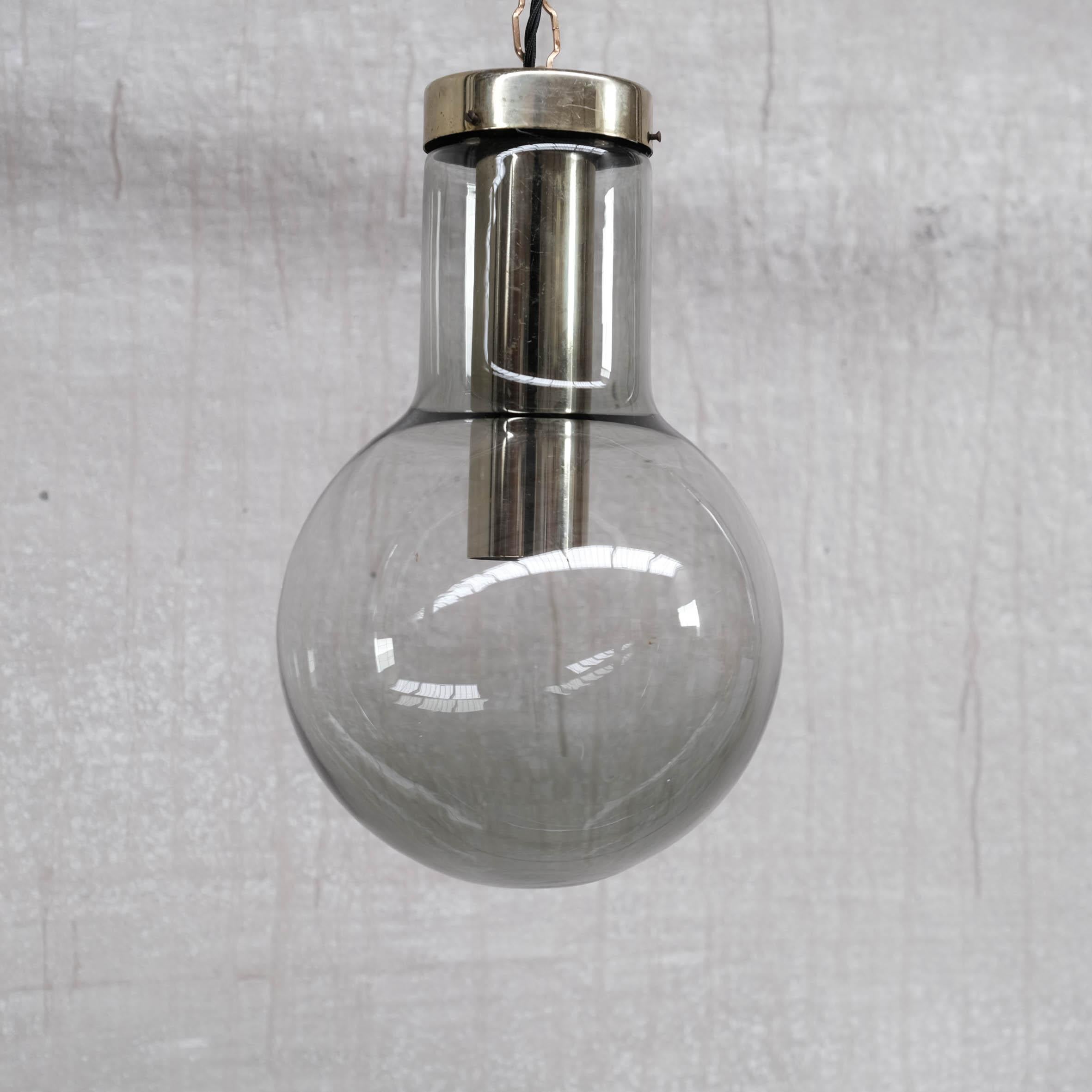 Late 20th Century Large Smoked Midcentury Glass and Brass Pendant Lights by RAAK '2 Available' For Sale