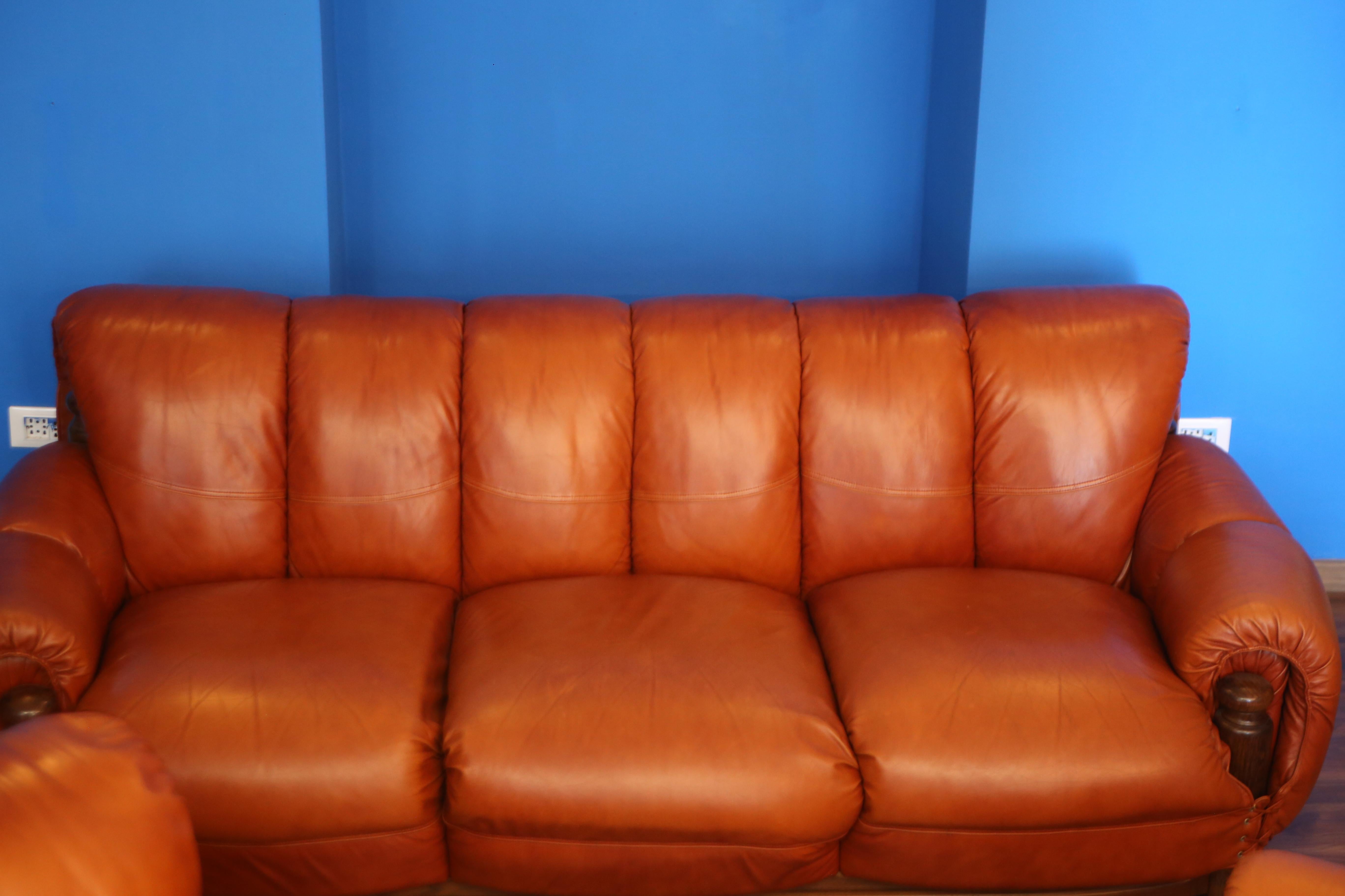 Late 20th Century large sofa in cognac colored leather in the style of sergio rodriguez For Sale