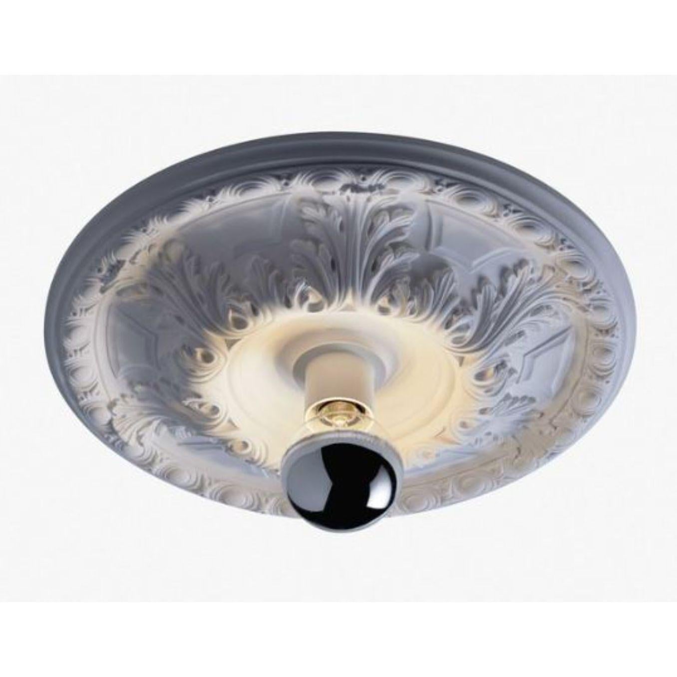Large Solferino ceiling light by Radar
Design: Bastien Taillard.
Materials: Metal, plaster of Paris, fiberglass.
Dimensions: W 72.5 x D 72.5 x H 15 cm.
Also Available with a double layer of mat white paint or in raw plaster ready to paint. Bulb