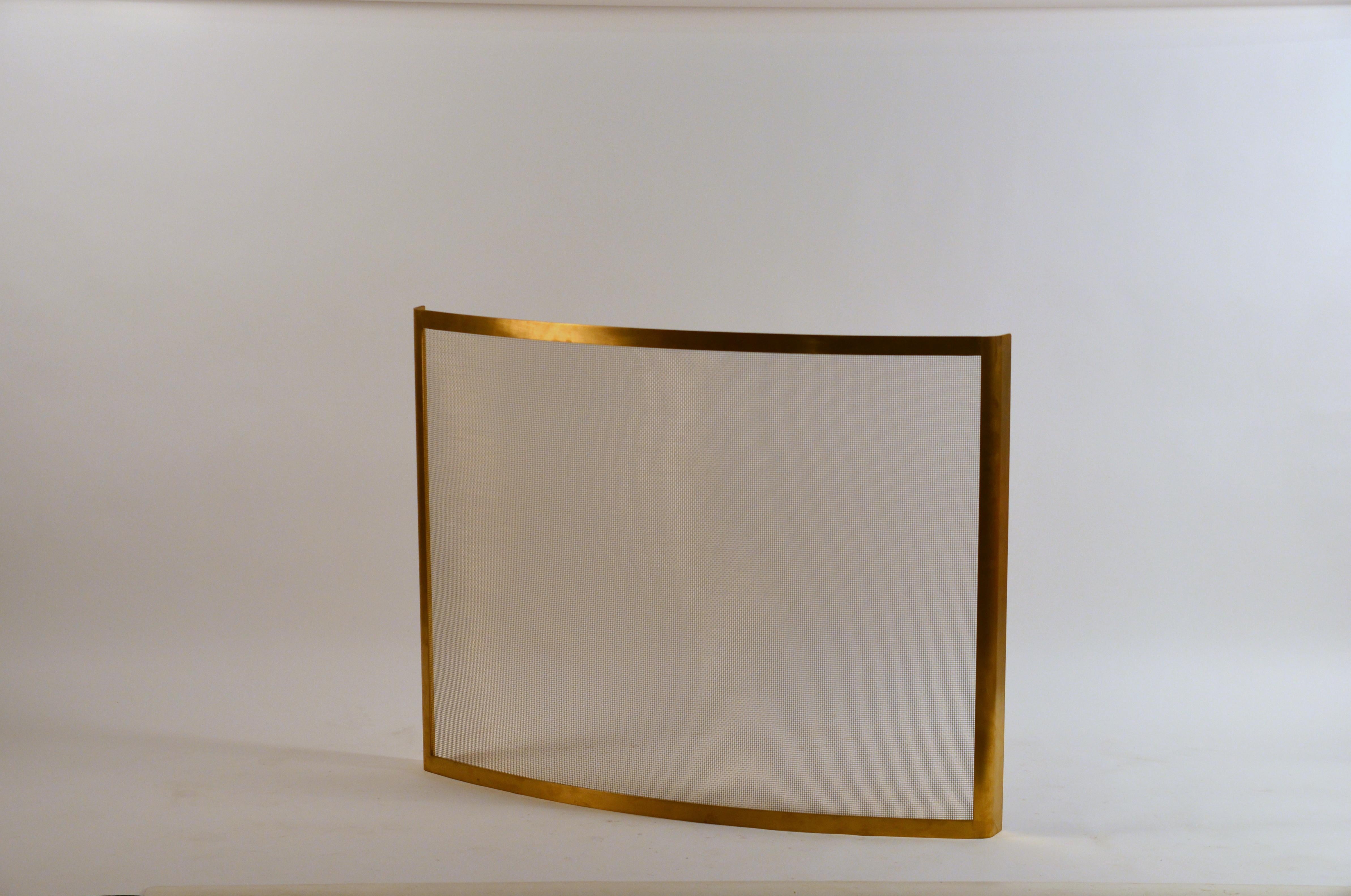 Large solid polished brass fireplace screen.

Simple, Minimalist bowed design.