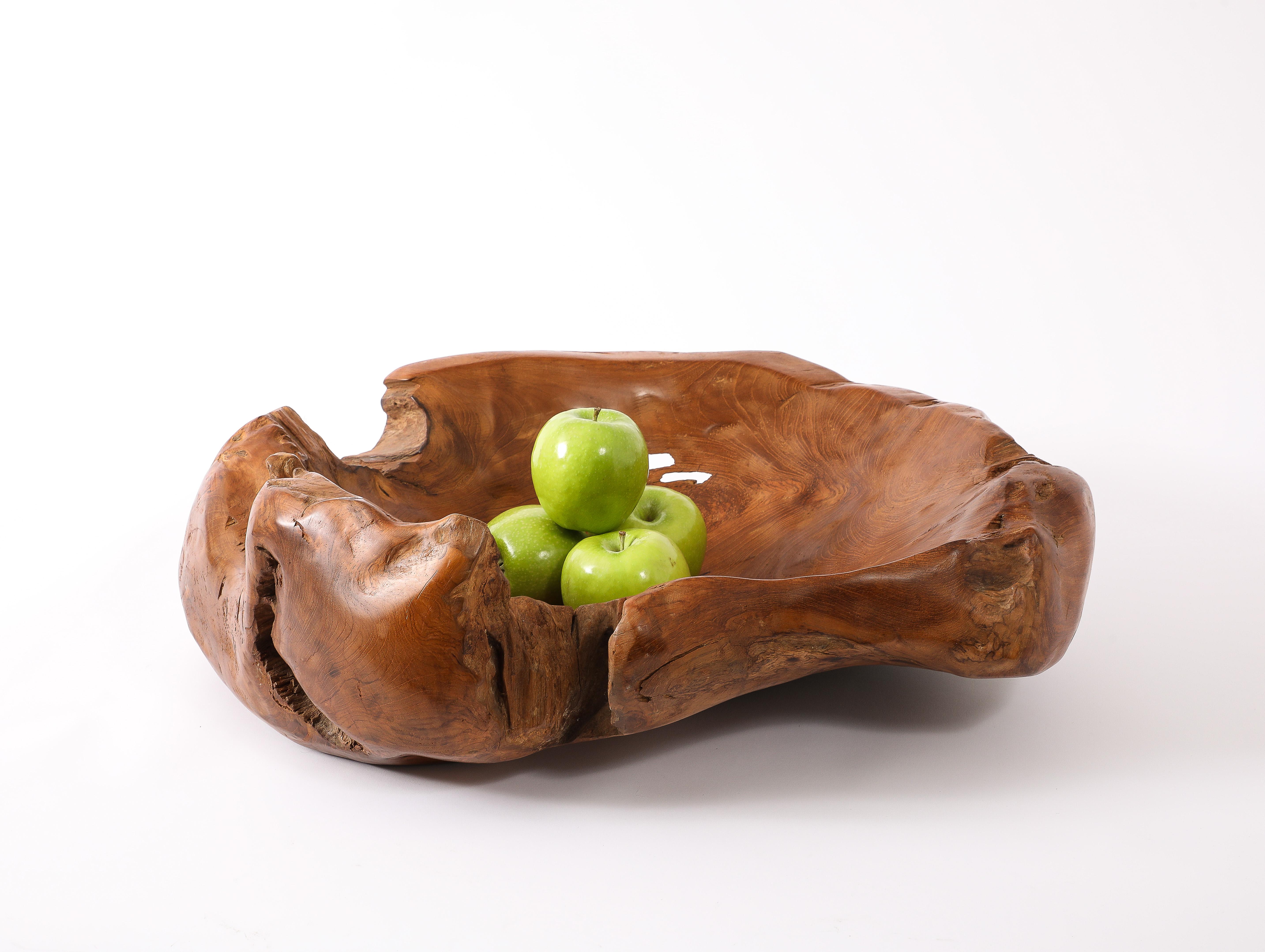 Large and impressive burl vessel, hand carved using the natural features of the wood, it is reminiscent of the work of Alexandre Noll.