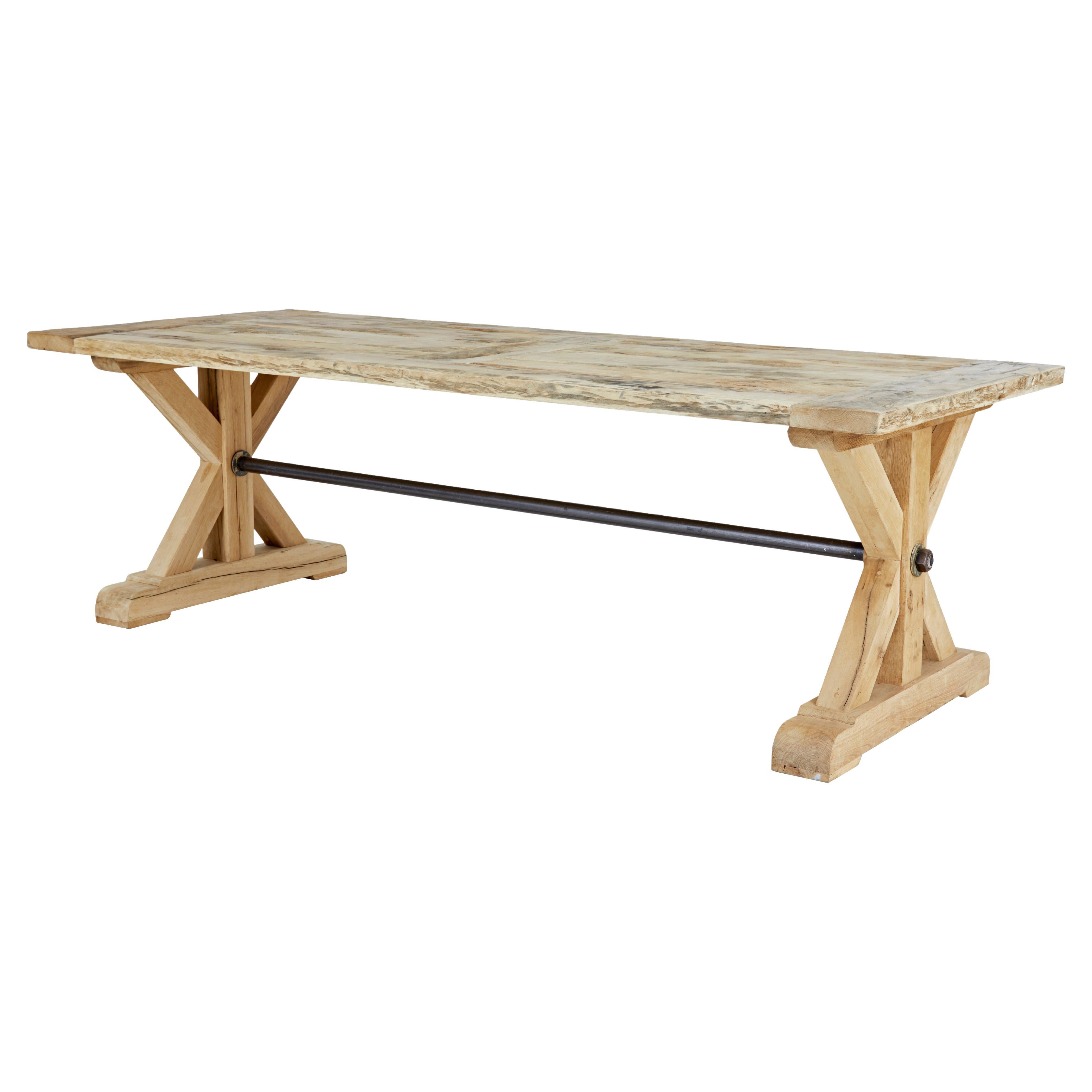 Large solid oak x frame dining table For Sale