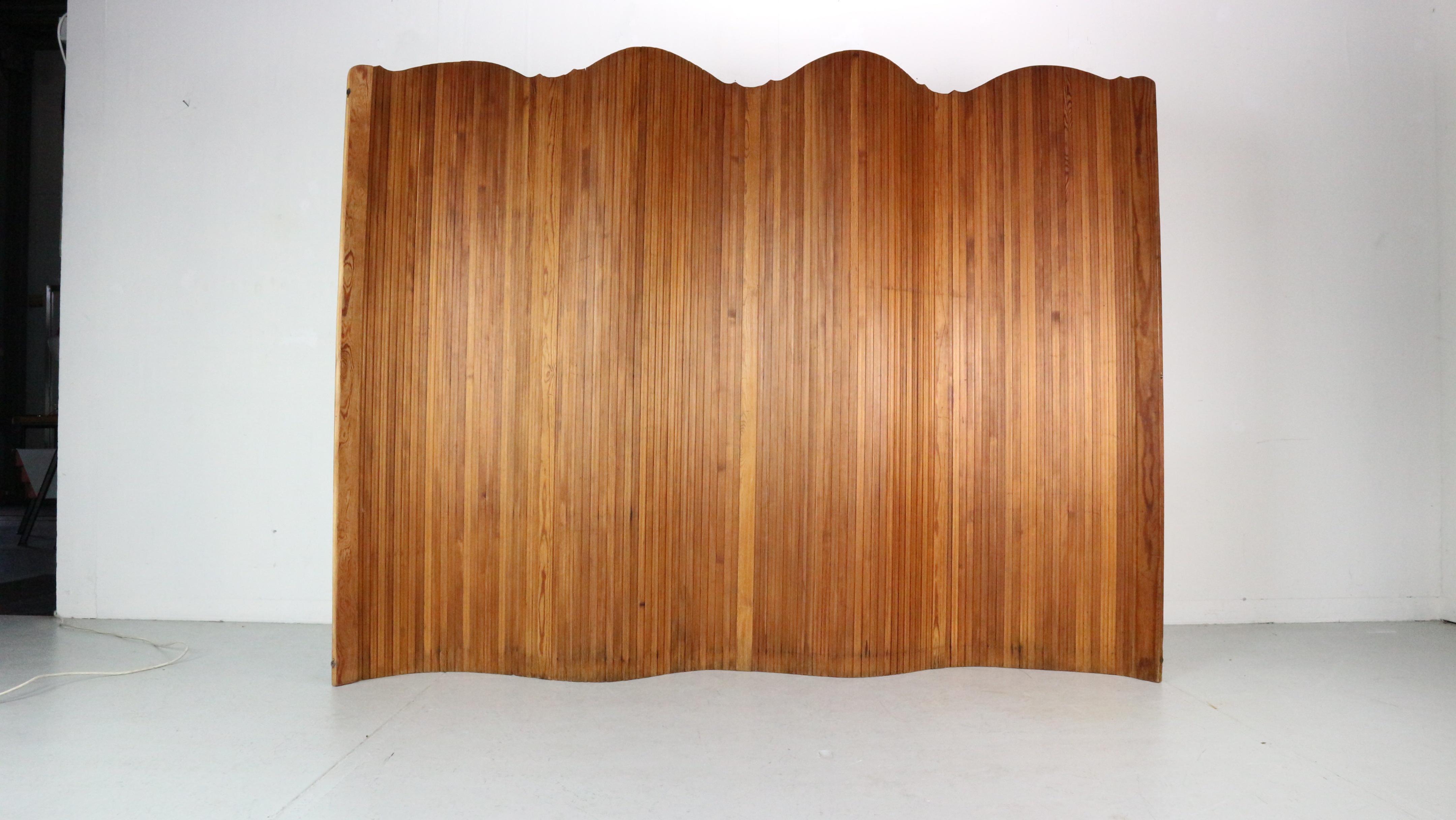 Large solid pine room divider by S.N.S.A. , France 1930s.  10