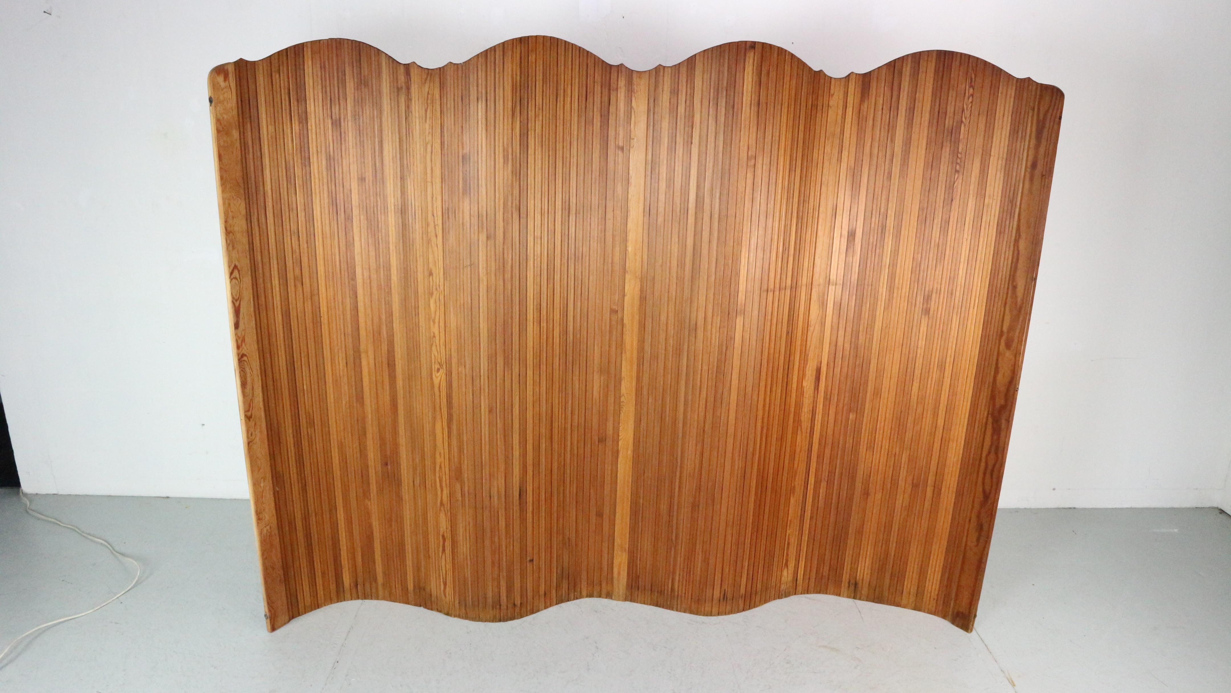 Large solid pine room divider by S.N.S.A. , France 1930s.  11