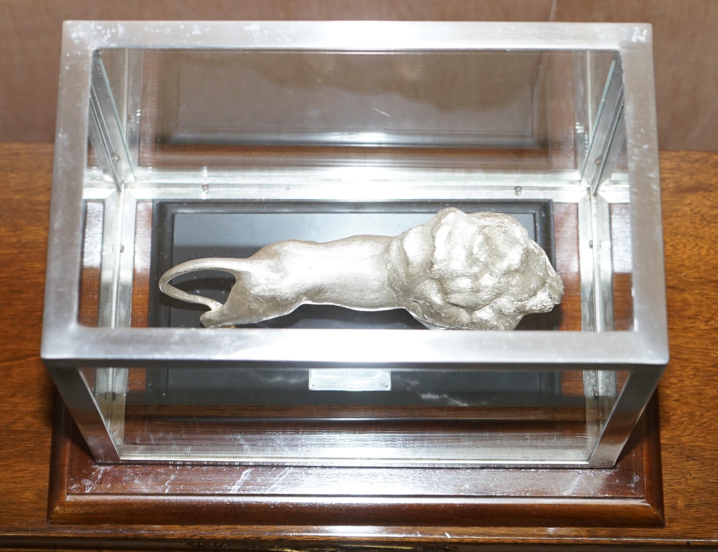 We are delighted to offer for sale this one of a kind custom made presentation gift of a 1.2 kilo solid sterling silver African Lion seated on a marble base with an impressive exhibition case

A truly stunning find, the case alone is pure quality