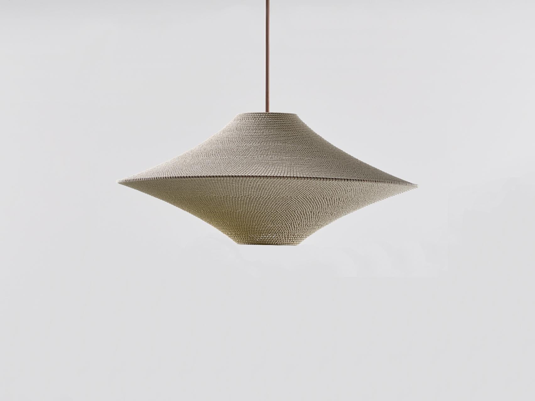 Large Solitaire pendant lamp by Naomi Paul
Dimensions: D 80 x H 37 cm
Materials: metal frame, Egyptian cotton cord.
Color: Ecru.
Available in other colors and in 5 sizes: D34, D50, D60, D80, D100 cm.
Available in plain, trim, 50/50 or bamboo