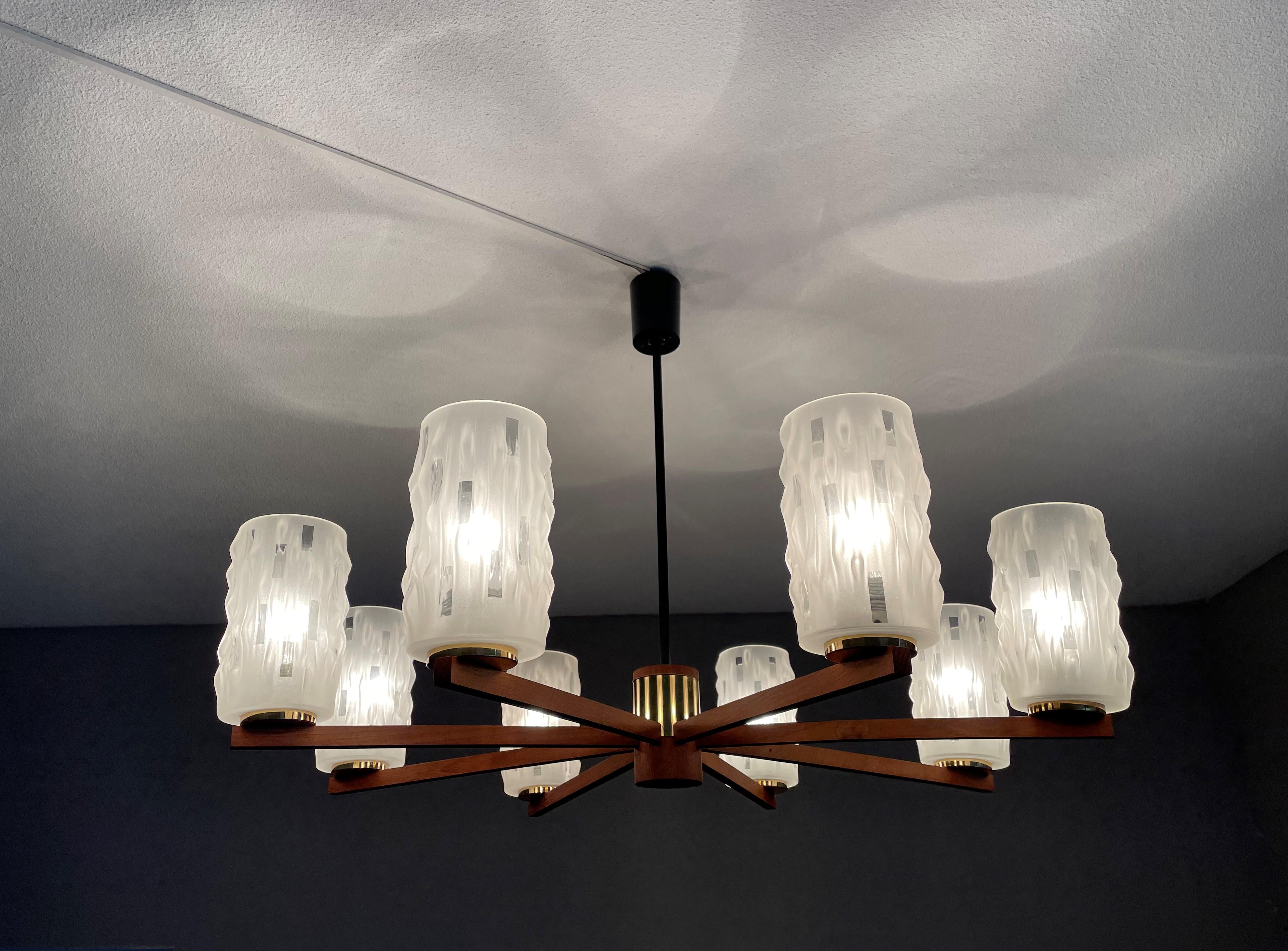 Beautiful and stylish pendant light from the heydays of the Scandinavian Design era. 

If you are looking for a rare and stylish chandelier to complement your midcentury or your contemporary interior then this handcrafted Scandinavian light