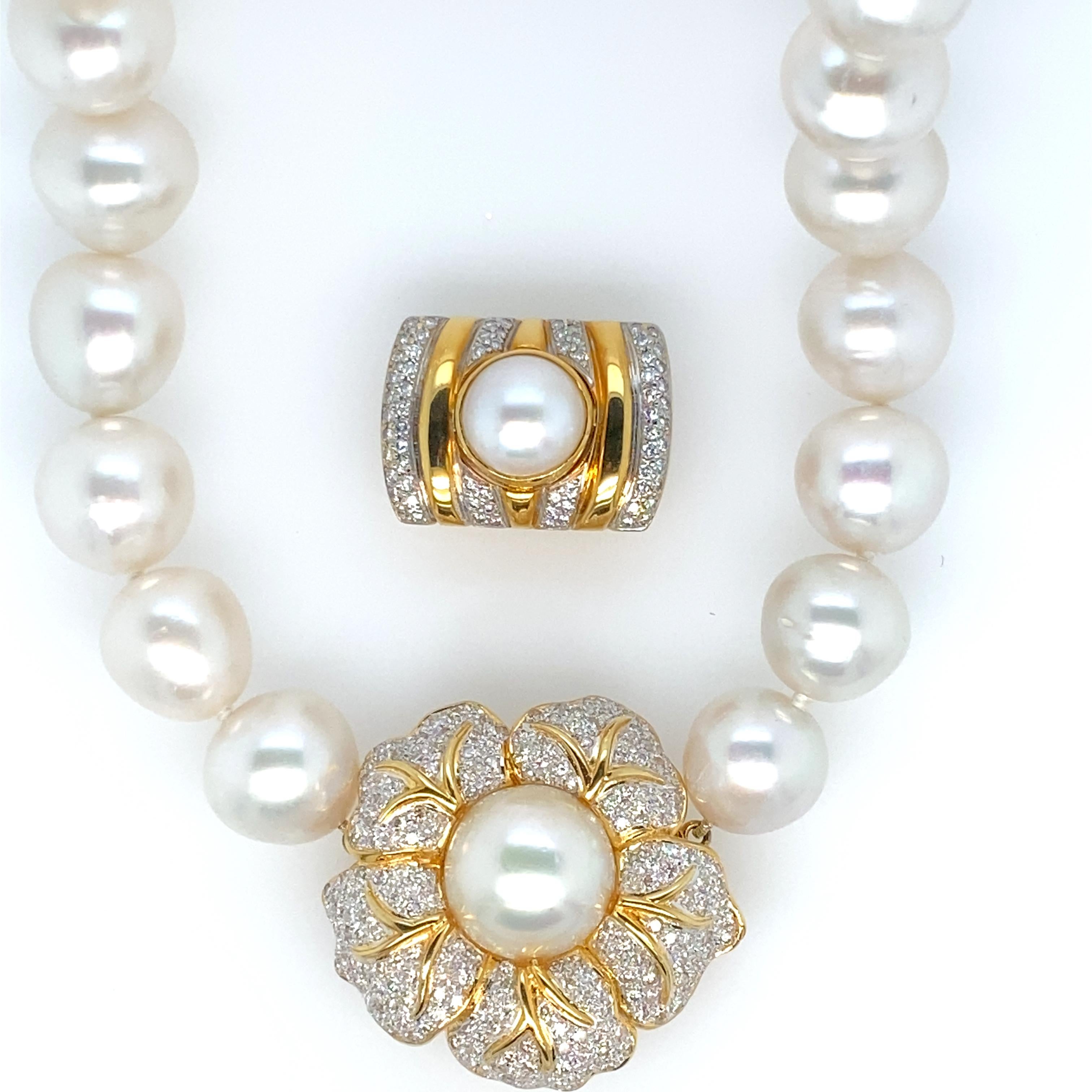Extra large South Sea pearls make this stunning necklace unique!  The pearls vary in size from 14.5 mm to 18.35mm.  They are white in color, and have a very high lustre.  The unique clasp detaches so another one, shown in the picture, can be added. 